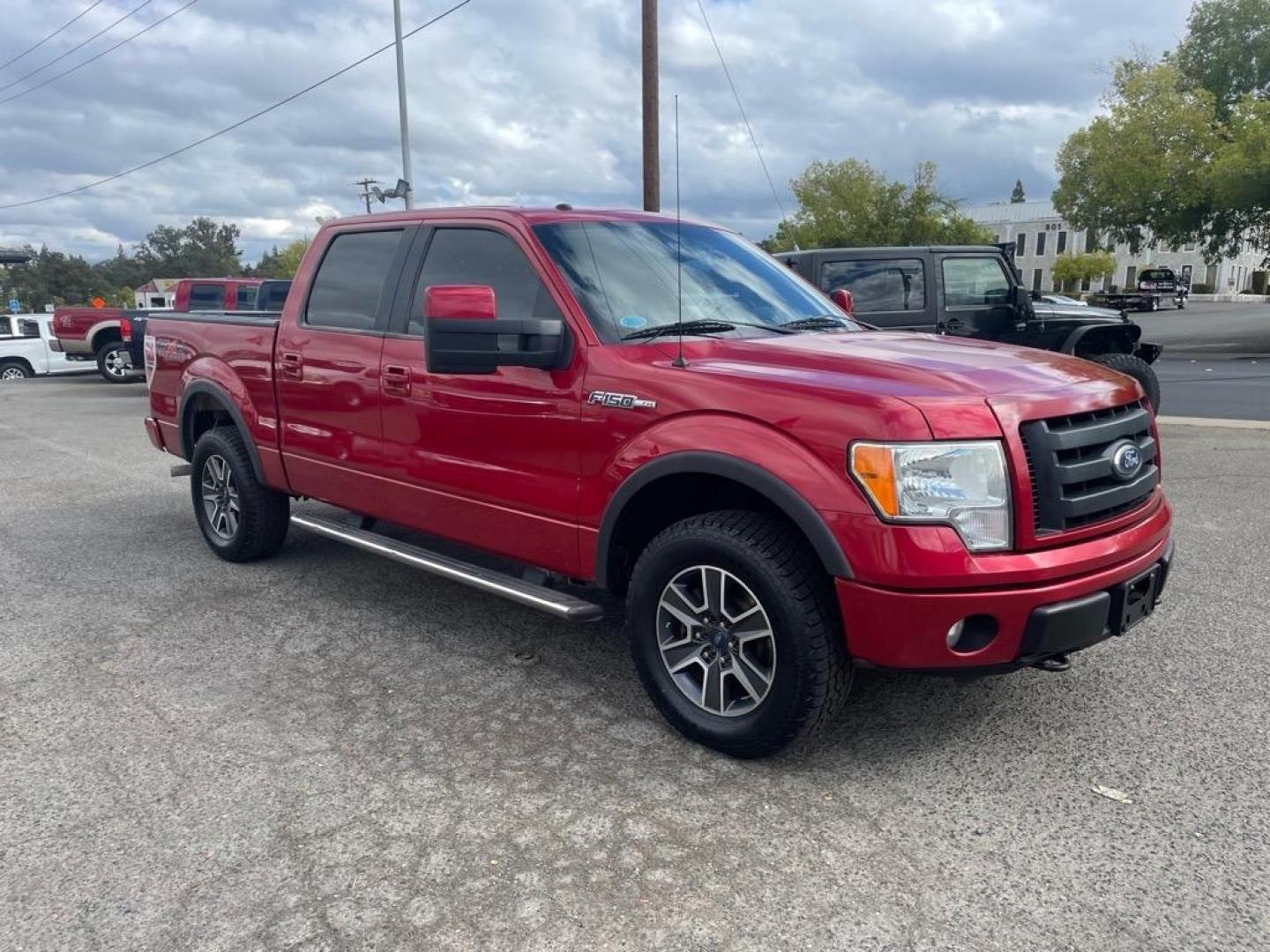 2010 Red Candy Metallic Ford F-150 FX4 (1FTFW1EVXAF) with an 5.4L Triton 5.4L Flex Fuel V8 320hp 390ft. lbs. Sequential Multiport Fuel Injection engine, 6-Speed Automatic transmission, located at 800 Riverside Ave, Roseville, CA, 95678, (916) 773-4549, 38.732265, -121.291039 - Photo#1
