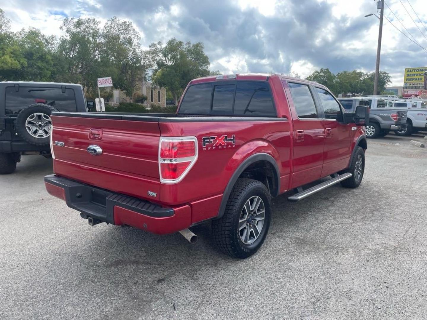 2010 Red Candy Metallic Ford F-150 FX4 (1FTFW1EVXAF) with an 5.4L Triton 5.4L Flex Fuel V8 320hp 390ft. lbs. Sequential Multiport Fuel Injection engine, 6-Speed Automatic transmission, located at 800 Riverside Ave, Roseville, CA, 95678, (916) 773-4549, 38.732265, -121.291039 - Photo#3