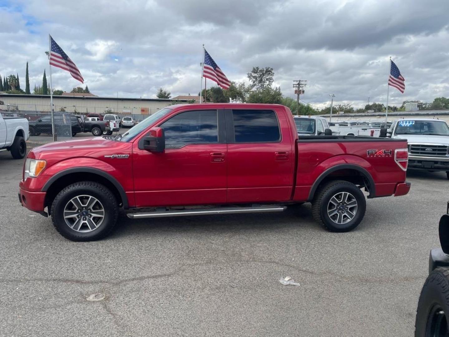 2010 Red Candy Metallic Ford F-150 FX4 (1FTFW1EVXAF) with an 5.4L Triton 5.4L Flex Fuel V8 320hp 390ft. lbs. Sequential Multiport Fuel Injection engine, 6-Speed Automatic transmission, located at 800 Riverside Ave, Roseville, CA, 95678, (916) 773-4549, 38.732265, -121.291039 - Photo#4