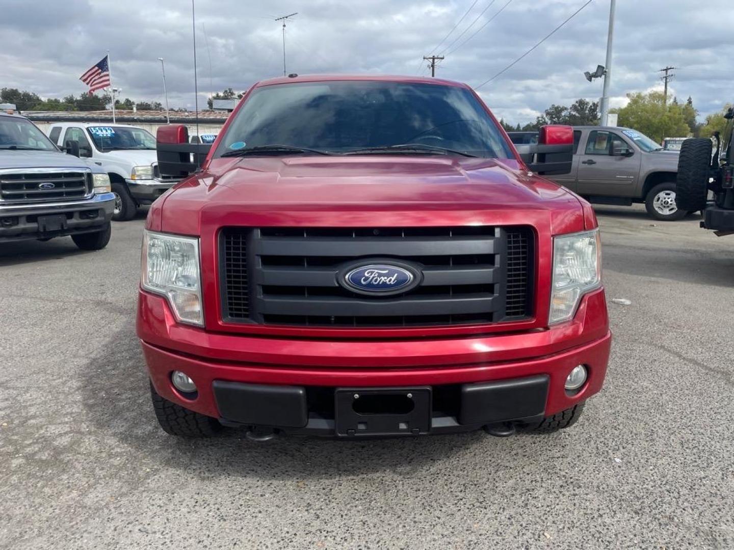 2010 Red Candy Metallic Ford F-150 FX4 (1FTFW1EVXAF) with an 5.4L Triton 5.4L Flex Fuel V8 320hp 390ft. lbs. Sequential Multiport Fuel Injection engine, 6-Speed Automatic transmission, located at 800 Riverside Ave, Roseville, CA, 95678, (916) 773-4549, 38.732265, -121.291039 - Photo#7