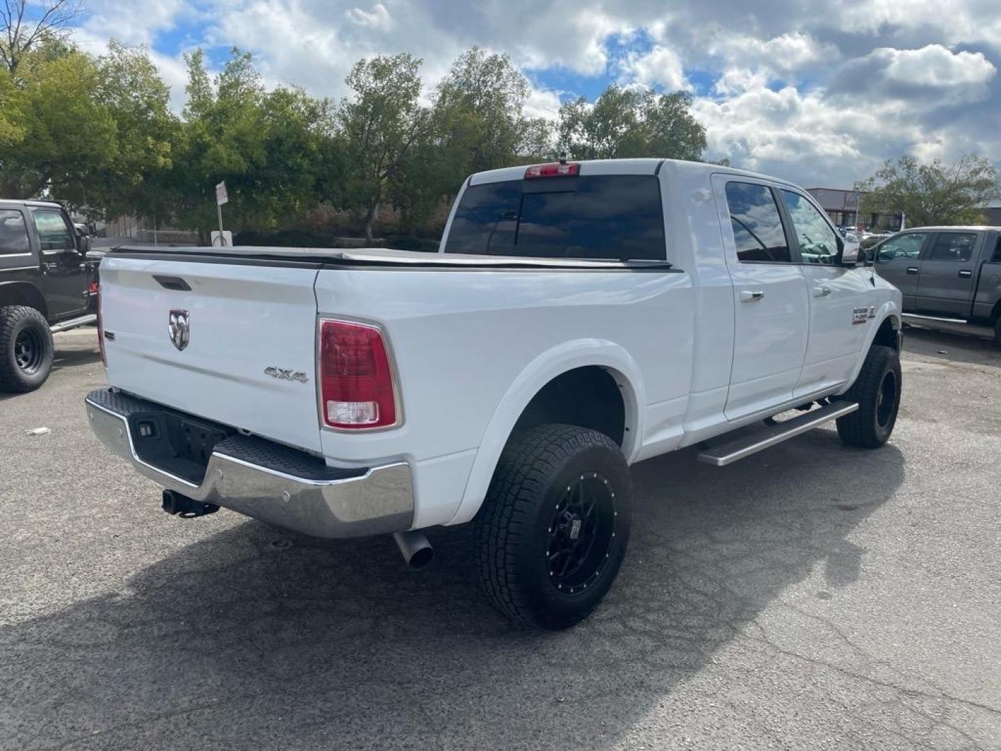 2017 Bright White Clear Coat RAM 2500 Laramie (3C6UR5NL6HG) with an 6.7L Cummins 6.7L Diesel Turbo I6 350hp 660ft. lbs. Common Rail Direct Injection engine, Automatic transmission, located at 800 Riverside Ave, Roseville, CA, 95678, (916) 773-4549, 38.732265, -121.291039 - CUMMINS DIESEL MEGA CAB 4X4 LARAMIE CLEAN CARFAX - Photo#3
