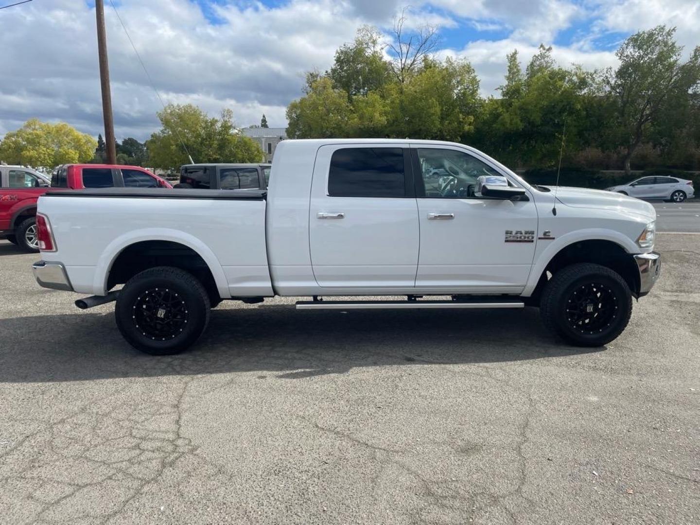 2017 Bright White Clear Coat RAM 2500 Laramie (3C6UR5NL6HG) with an 6.7L Cummins 6.7L Diesel Turbo I6 350hp 660ft. lbs. Common Rail Direct Injection engine, Automatic transmission, located at 800 Riverside Ave, Roseville, CA, 95678, (916) 773-4549, 38.732265, -121.291039 - CUMMINS DIESEL MEGA CAB 4X4 LARAMIE CLEAN CARFAX - Photo#5