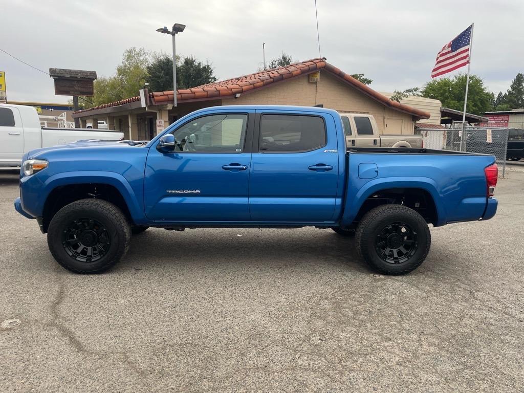 2017 Blazing Blue Pearl Toyota Tacoma TRD Sport (5TFCZ5AN6HX) with an 3.5L 3.5L V6 278hp 265ft. lbs. Direct Injection engine, 6-Speed Manual transmission, located at 800 Riverside Ave, Roseville, CA, 95678, (916) 773-4549, 38.732265, -121.291039 - 4X4 DOUBLE CAB TRD SPORT LEATHER MOON ROOF SERVICE RECORDS MANUAL TRANSMISSION - Photo#4