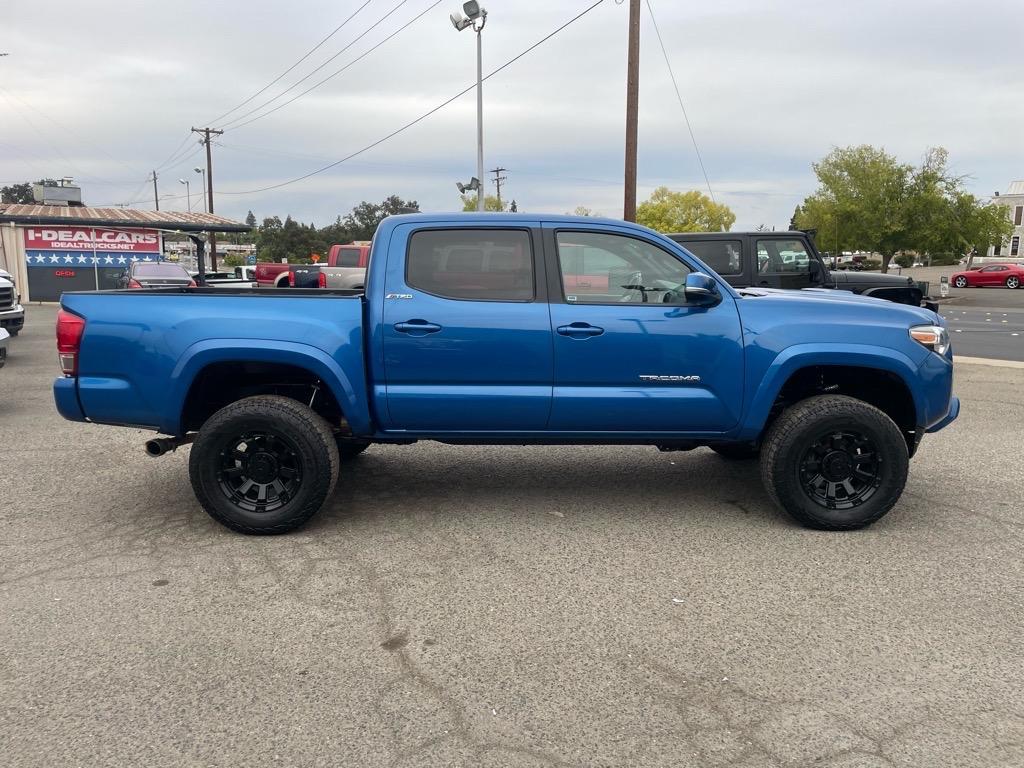 2017 Blazing Blue Pearl Toyota Tacoma TRD Sport (5TFCZ5AN6HX) with an 3.5L 3.5L V6 278hp 265ft. lbs. Direct Injection engine, 6-Speed Manual transmission, located at 800 Riverside Ave, Roseville, CA, 95678, (916) 773-4549, 38.732265, -121.291039 - 4X4 DOUBLE CAB TRD SPORT LEATHER MOON ROOF SERVICE RECORDS MANUAL TRANSMISSION - Photo#5