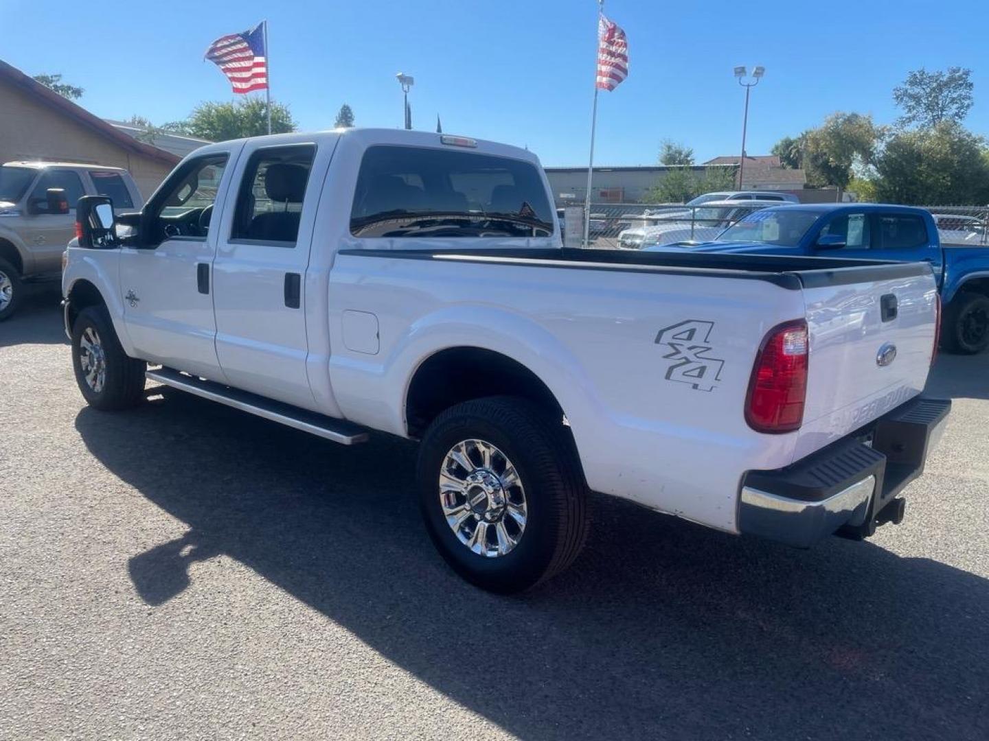 2013 Oxford White Ford F-250 Super Duty XLT (1FT7W2BT0DE) with an 6.7L Power Stroke 6.7L Biodiesel Turbo V8 400hp 800ft. lbs. Common Rail Direct Injection engine, 6-Speed Shiftable Automatic transmission, located at 800 Riverside Ave, Roseville, CA, 95678, (916) 773-4549, 38.732265, -121.291039 - DIESEL CREW CAB 4X4 XLT - Photo#2