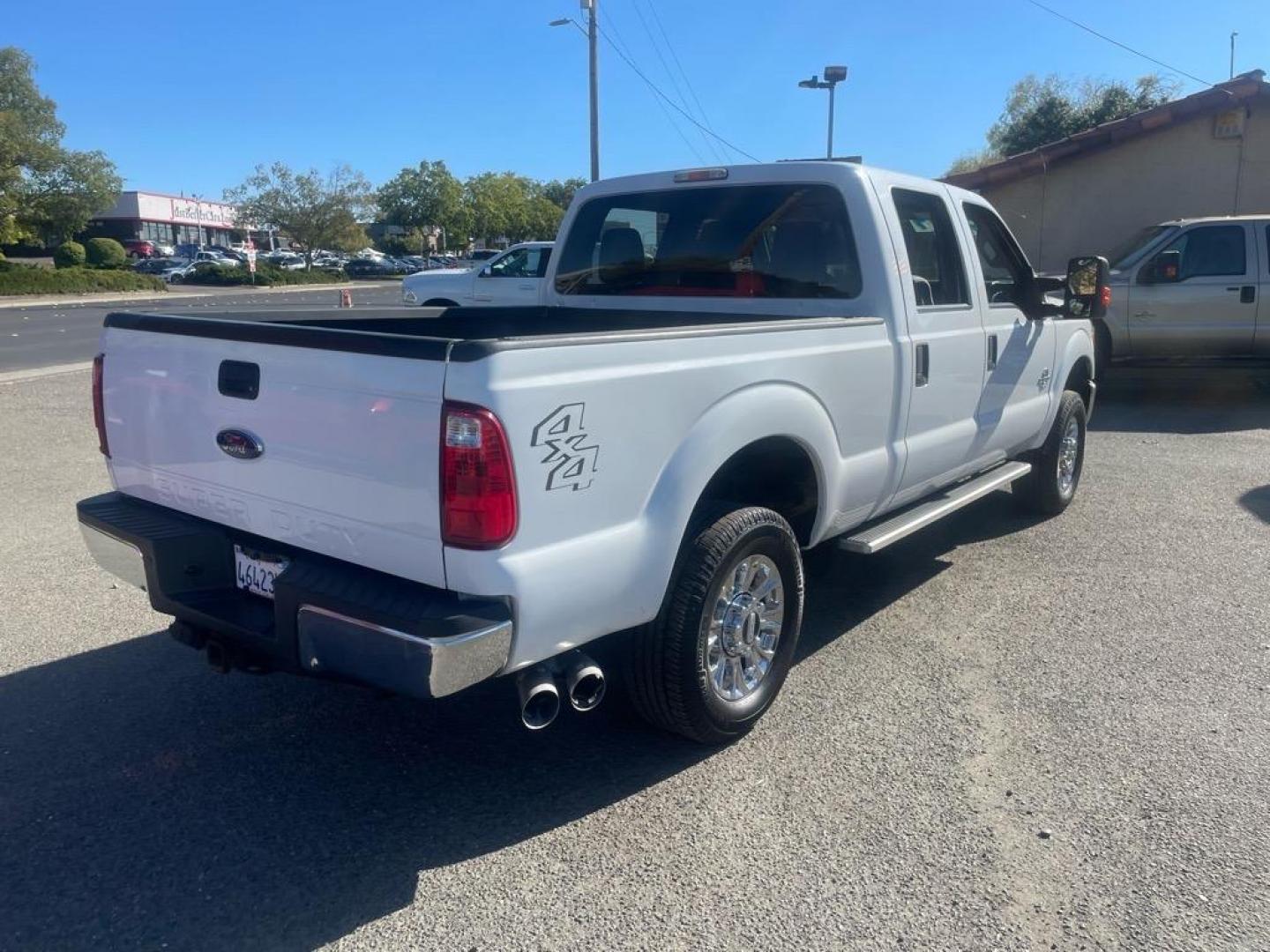 2013 Oxford White Ford F-250 Super Duty XLT (1FT7W2BT0DE) with an 6.7L Power Stroke 6.7L Biodiesel Turbo V8 400hp 800ft. lbs. Common Rail Direct Injection engine, 6-Speed Shiftable Automatic transmission, located at 800 Riverside Ave, Roseville, CA, 95678, (916) 773-4549, 38.732265, -121.291039 - DIESEL CREW CAB 4X4 XLT - Photo#3