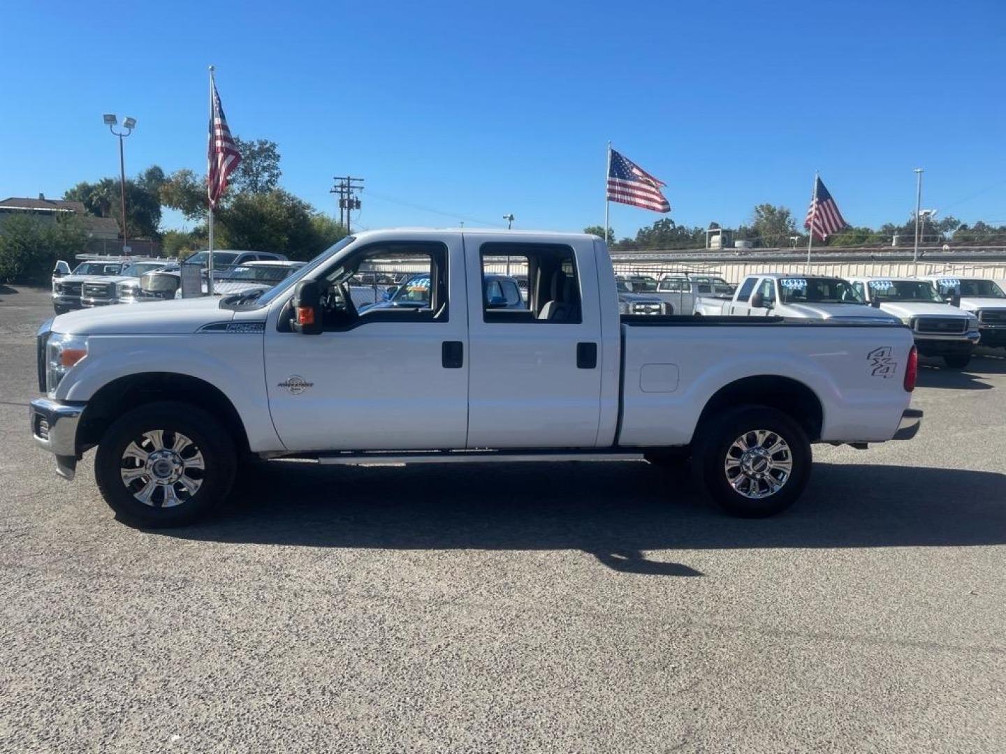 2013 Oxford White Ford F-250 Super Duty XLT (1FT7W2BT0DE) with an 6.7L Power Stroke 6.7L Biodiesel Turbo V8 400hp 800ft. lbs. Common Rail Direct Injection engine, 6-Speed Shiftable Automatic transmission, located at 800 Riverside Ave, Roseville, CA, 95678, (916) 773-4549, 38.732265, -121.291039 - DIESEL CREW CAB 4X4 XLT - Photo#4