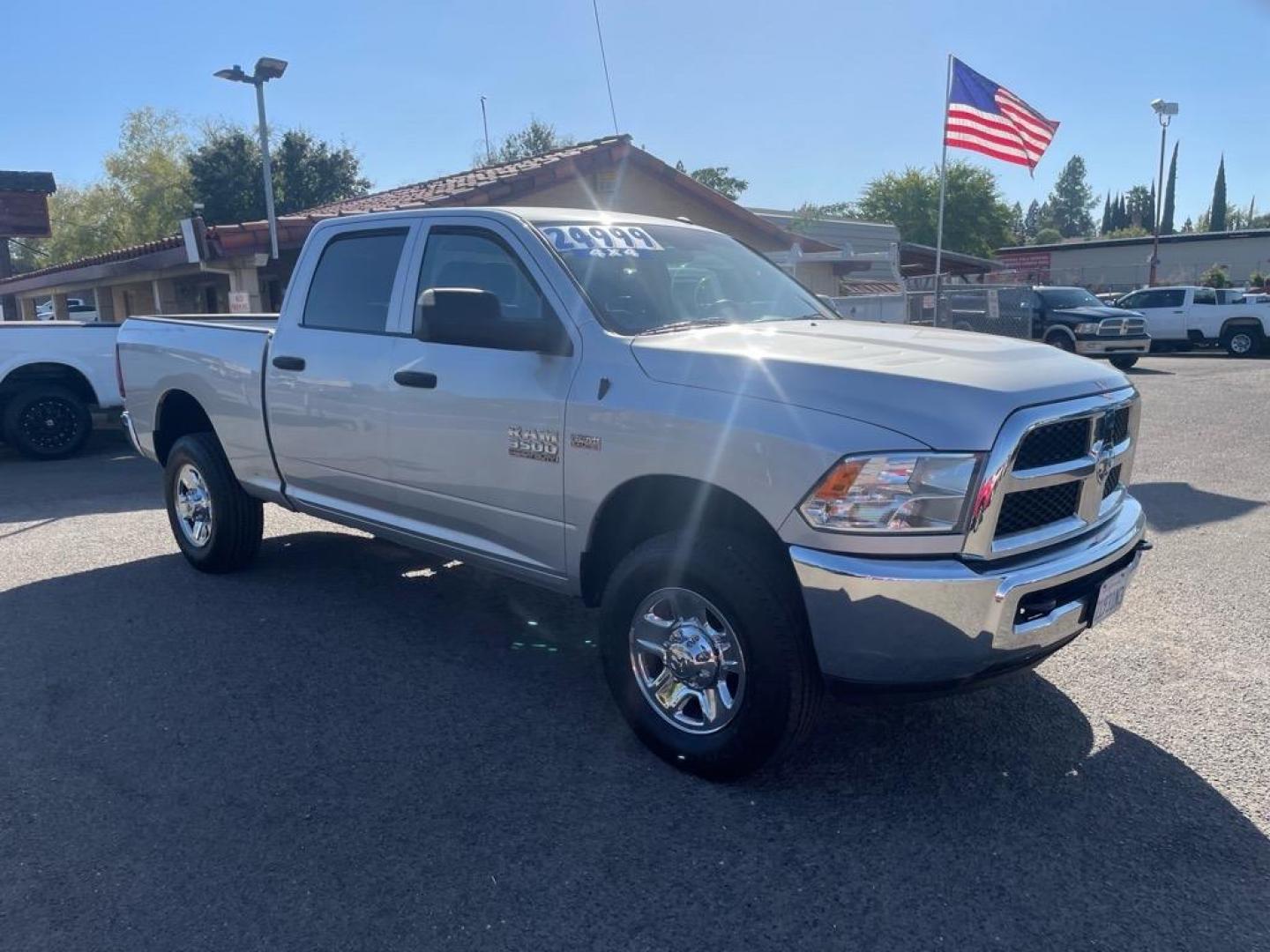 2018 Bright Silver Metallic Clear Coat RAM 3500 Tradesman (3C63R3CJ4JG) with an 6.4L HEMI 6.4L V8 410hp 429ft. lbs. Sequential Multiport Fuel Injection engine, 6-Speed Shiftable Automatic transmission, located at 800 Riverside Ave, Roseville, CA, 95678, (916) 773-4549, 38.732265, -121.291039 - CREW CAB 4X4 TRADESMAN 6.4 HEMI NEW TIRES CLEAN CARFAX - Photo#1