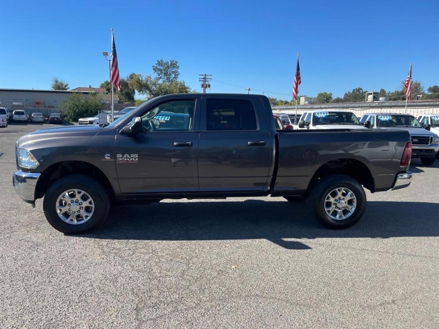 2016 Granite Crystal Metallic Clear Coat RAM 3500 Tradesman (3C63R3CL6GG) with an 6.7L Cummins 6.7L Diesel Turbo I6 350hp 660ft. lbs. Common Rail Direct Injection engine, Automatic transmission, located at 800 Riverside Ave, Roseville, CA, 95678, (916) 773-4549, 38.732265, -121.291039 - Photo#1