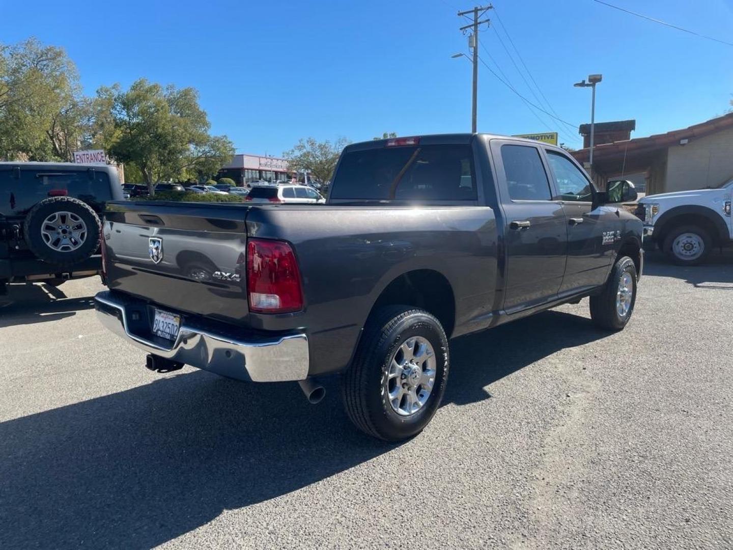 2016 Granite Crystal Metallic Clear Coat RAM 3500 Tradesman (3C63R3CL6GG) with an 6.7L Cummins 6.7L Diesel Turbo I6 350hp 660ft. lbs. Common Rail Direct Injection engine, Automatic transmission, located at 800 Riverside Ave, Roseville, CA, 95678, (916) 773-4549, 38.732265, -121.291039 - Photo#4