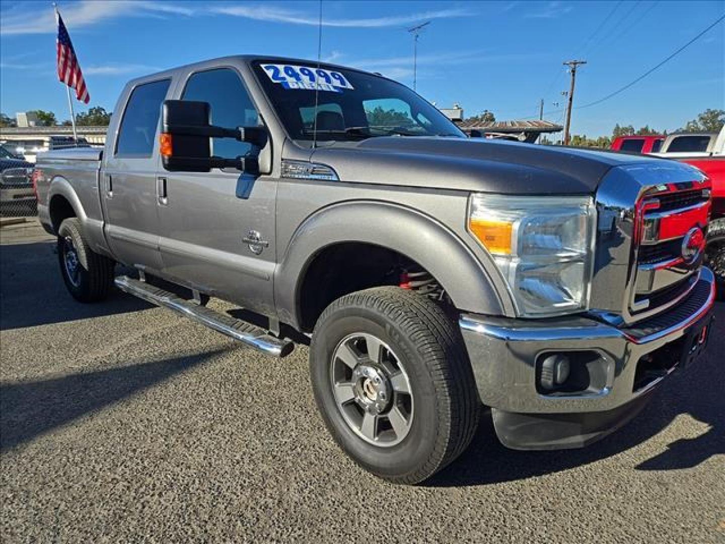 2011 Sterling Grey Metallic Ford F-250 Super Duty Lariat (1FT7W29F1BE) with an 6.7L Power Stroke 6.7L Biodiesel Turbo V8 400hp 800ft. lbs. Common Rail Direct Injection engine, 6-Speed Shiftable Automatic transmission, located at 800 Riverside Ave, Roseville, CA, 95678, (916) 773-4549, 38.732265, -121.291039 - DIESEL CREW CAB 4X4 FX4 LOW MILES 1 OWNER - Photo#2