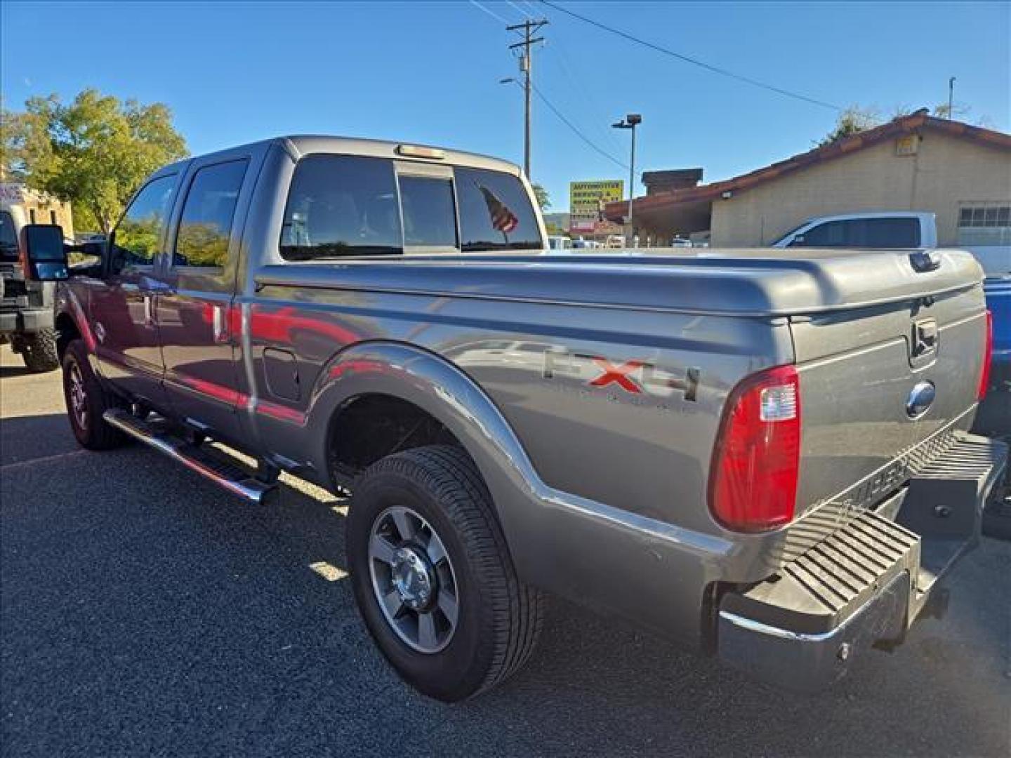 2011 Sterling Grey Metallic Ford F-250 Super Duty Lariat (1FT7W29F1BE) with an 6.7L Power Stroke 6.7L Biodiesel Turbo V8 400hp 800ft. lbs. Common Rail Direct Injection engine, 6-Speed Shiftable Automatic transmission, located at 800 Riverside Ave, Roseville, CA, 95678, (916) 773-4549, 38.732265, -121.291039 - DIESEL CREW CAB 4X4 FX4 LOW MILES 1 OWNER - Photo#3