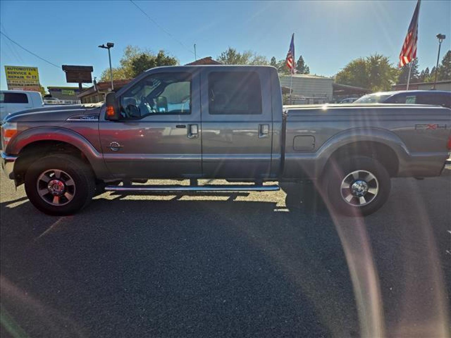 2011 Sterling Grey Metallic Ford F-250 Super Duty Lariat (1FT7W29F1BE) with an 6.7L Power Stroke 6.7L Biodiesel Turbo V8 400hp 800ft. lbs. Common Rail Direct Injection engine, 6-Speed Shiftable Automatic transmission, located at 800 Riverside Ave, Roseville, CA, 95678, (916) 773-4549, 38.732265, -121.291039 - DIESEL CREW CAB 4X4 FX4 LOW MILES 1 OWNER - Photo#5