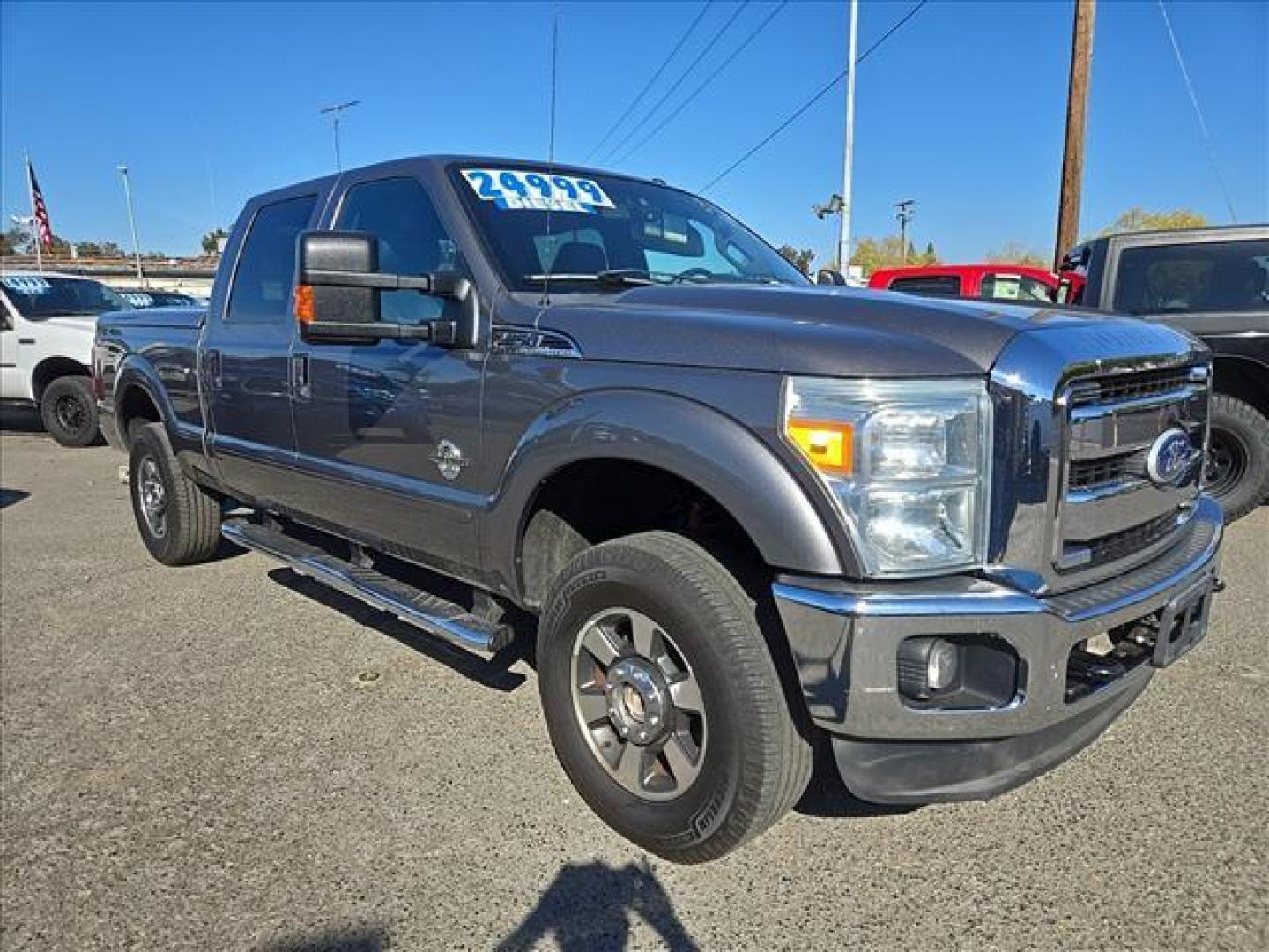 2011 Sterling Grey Metallic Ford F-250 Super Duty Lariat (1FT7W2BT1BE) with an 6.7L Power Stroke 6.7L Biodiesel Turbo V8 400hp 800ft. lbs. Common Rail Direct Injection engine, 6-Speed Shiftable Automatic transmission, located at 800 Riverside Ave, Roseville, CA, 95678, (916) 773-4549, 38.732265, -121.291039 - Photo#1