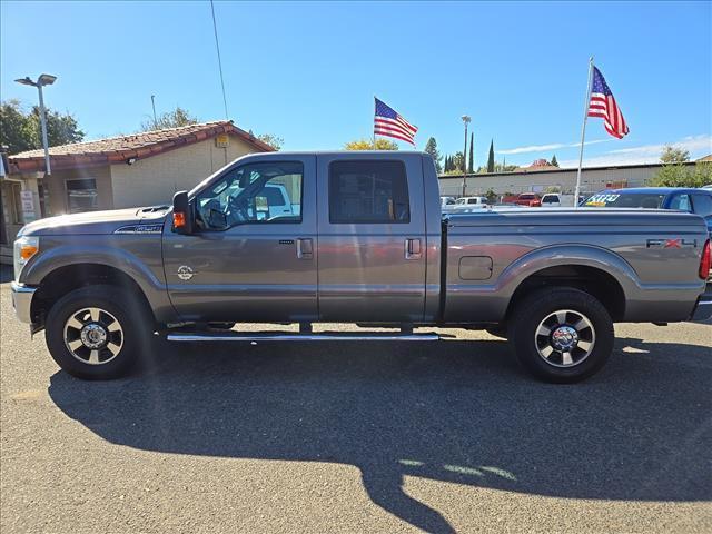2011 Sterling Grey Metallic Ford F-250 Super Duty Lariat (1FT7W2BT1BE) with an 6.7L Power Stroke 6.7L Biodiesel Turbo V8 400hp 800ft. lbs. Common Rail Direct Injection engine, 6-Speed Shiftable Automatic transmission, located at 800 Riverside Ave, Roseville, CA, 95678, (916) 773-4549, 38.732265, -121.291039 - DIESEL CREW CAB 4X4 FX4 LARIAT ONE OWNER LOW MILES - Photo#4