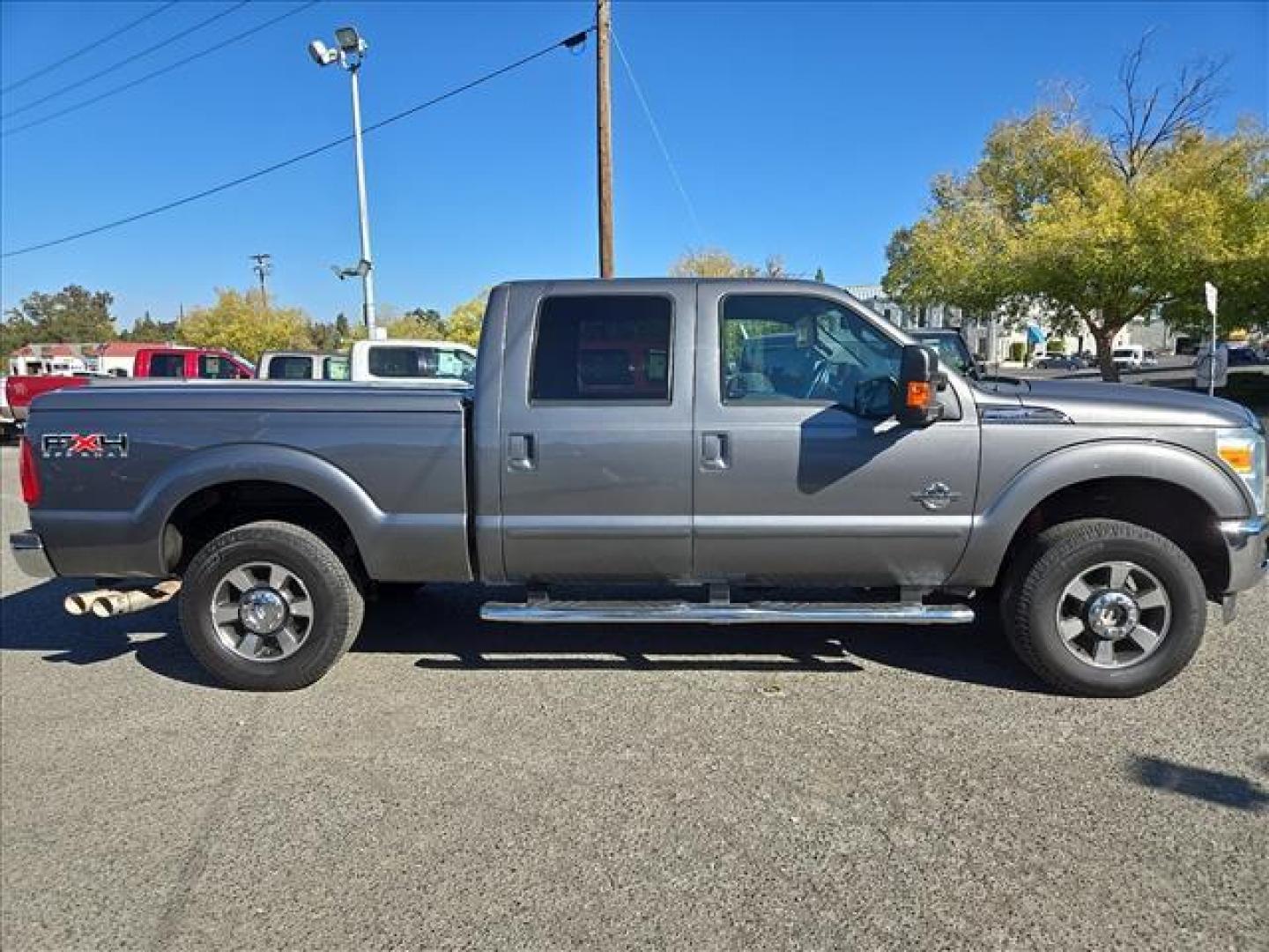 2011 Sterling Grey Metallic Ford F-250 Super Duty Lariat (1FT7W2BT1BE) with an 6.7L Power Stroke 6.7L Biodiesel Turbo V8 400hp 800ft. lbs. Common Rail Direct Injection engine, 6-Speed Shiftable Automatic transmission, located at 800 Riverside Ave, Roseville, CA, 95678, (916) 773-4549, 38.732265, -121.291039 - Photo#5