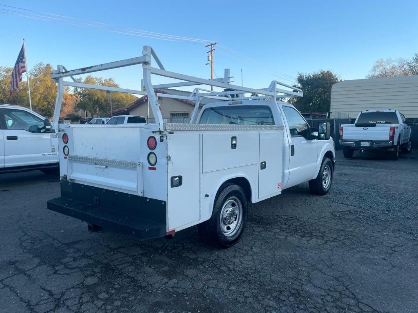 2014 Oxford White Ford F-350 Super Duty XL (1FDRF3A68EE) with an 6.2L 6.2L Flex Fuel V8 385hp 405ft. lbs. Sequential Electronic Fuel Injection engine, 6-Speed Shiftable Automatic transmission, located at 800 Riverside Ave, Roseville, CA, 95678, (916) 773-4549, 38.732265, -121.291039 - Photo#4