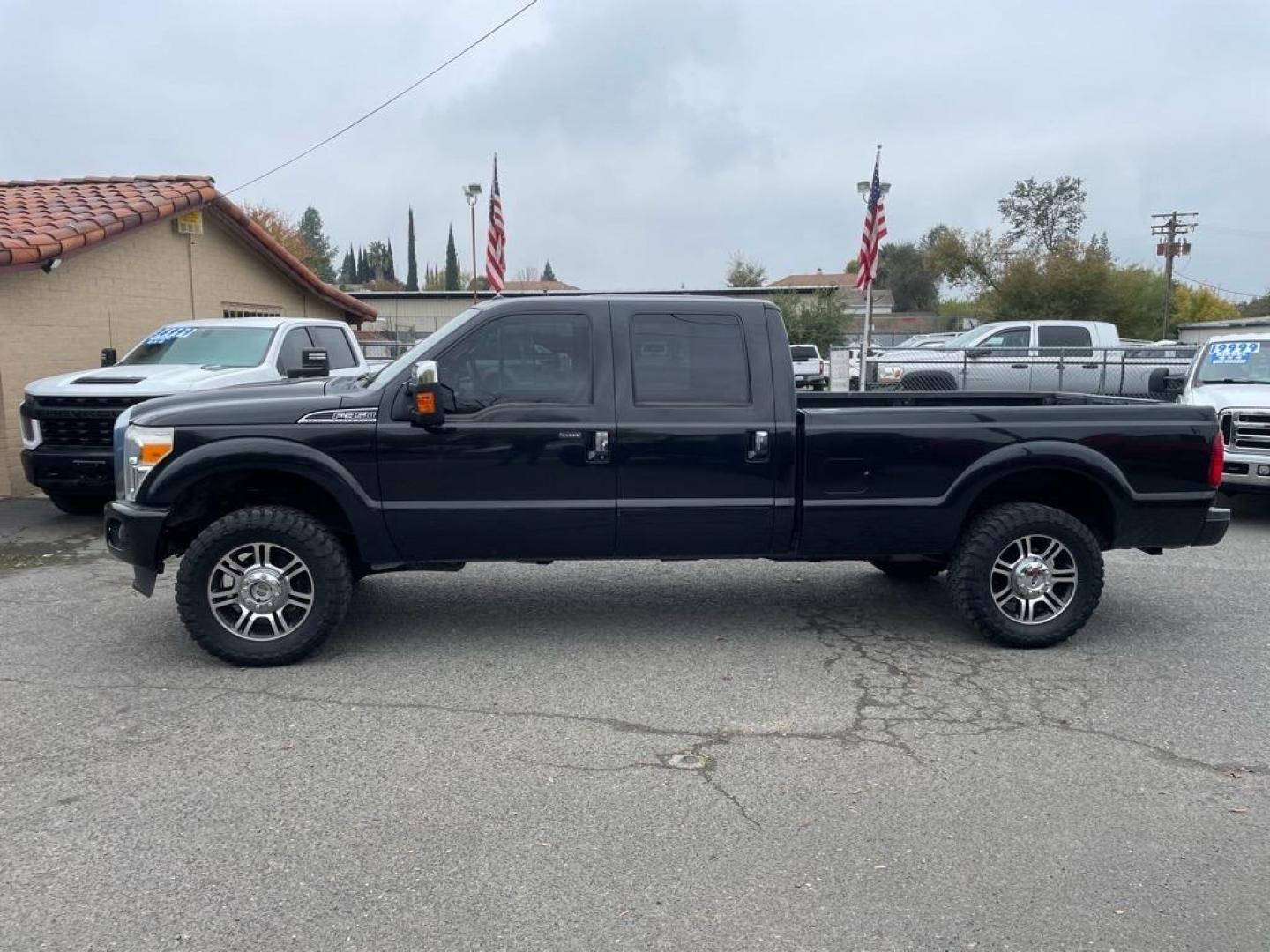 2013 Tuxedo Black Metallic Ford F-350 Super Duty Platinum (1FT8W3BT9DE) with an 6.7L Power Stroke 6.7L Biodiesel Turbo V8 400hp 800ft. lbs. Common Rail Direct Injection engine, 6-Speed Shiftable Automatic transmission, located at 800 Riverside Ave, Roseville, CA, 95678, (916) 773-4549, 38.732265, -121.291039 - Photo#1