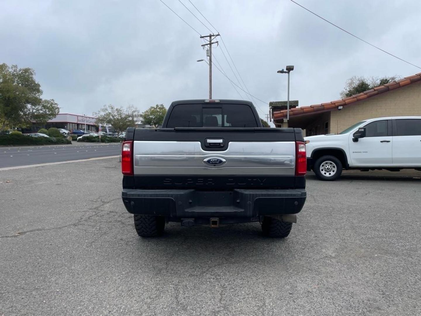 2013 Tuxedo Black Metallic Ford F-350 Super Duty Platinum (1FT8W3BT9DE) with an 6.7L Power Stroke 6.7L Biodiesel Turbo V8 400hp 800ft. lbs. Common Rail Direct Injection engine, 6-Speed Shiftable Automatic transmission, located at 800 Riverside Ave, Roseville, CA, 95678, (916) 773-4549, 38.732265, -121.291039 - Photo#2