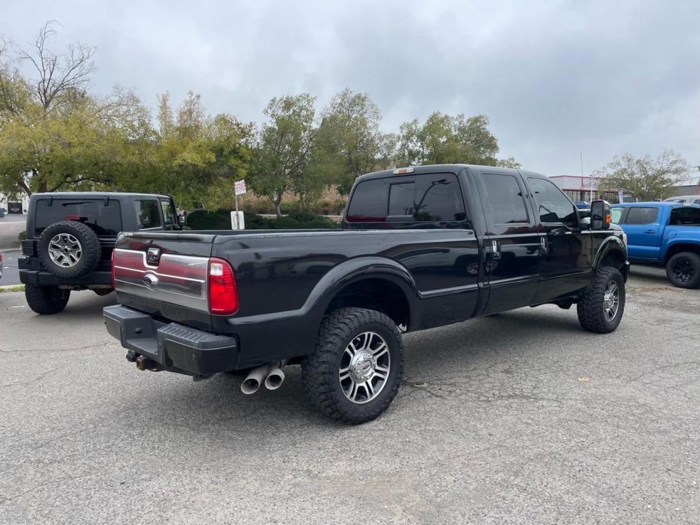 2013 Tuxedo Black Metallic Ford F-350 Super Duty Platinum (1FT8W3BT9DE) with an 6.7L Power Stroke 6.7L Biodiesel Turbo V8 400hp 800ft. lbs. Common Rail Direct Injection engine, 6-Speed Shiftable Automatic transmission, located at 800 Riverside Ave, Roseville, CA, 95678, (916) 773-4549, 38.732265, -121.291039 - Photo#3