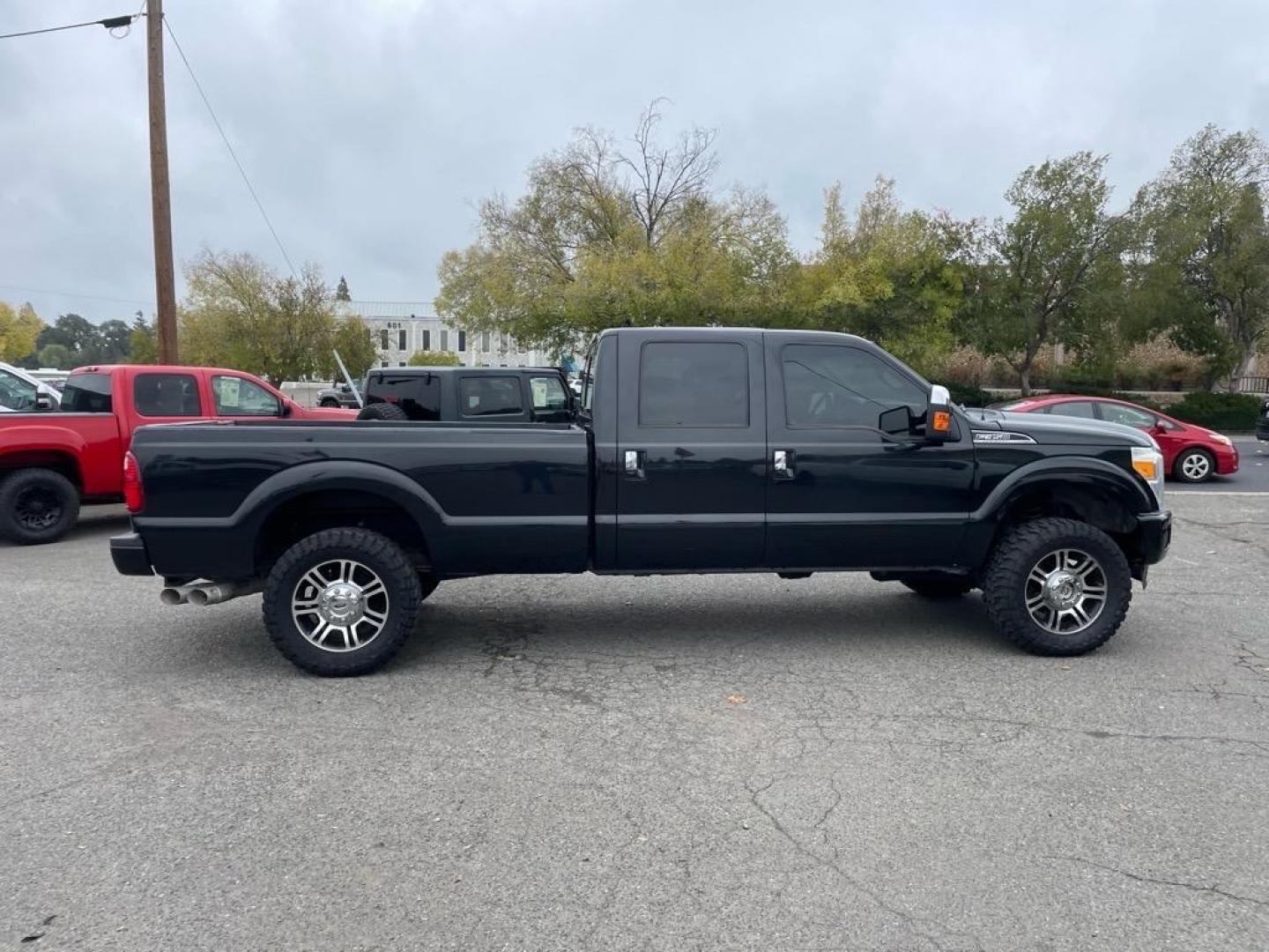 2013 Tuxedo Black Metallic Ford F-350 Super Duty Platinum (1FT8W3BT9DE) with an 6.7L Power Stroke 6.7L Biodiesel Turbo V8 400hp 800ft. lbs. Common Rail Direct Injection engine, 6-Speed Shiftable Automatic transmission, located at 800 Riverside Ave, Roseville, CA, 95678, (916) 773-4549, 38.732265, -121.291039 - Photo#4