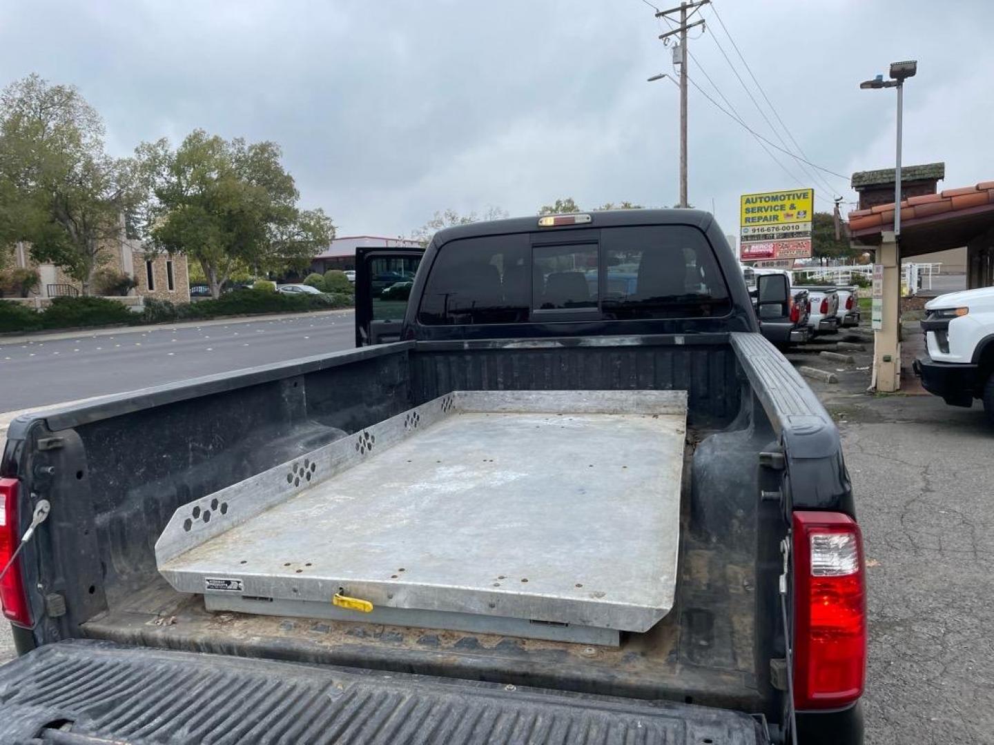 2013 Tuxedo Black Metallic Ford F-350 Super Duty Platinum (1FT8W3BT9DE) with an 6.7L Power Stroke 6.7L Biodiesel Turbo V8 400hp 800ft. lbs. Common Rail Direct Injection engine, 6-Speed Shiftable Automatic transmission, located at 800 Riverside Ave, Roseville, CA, 95678, (916) 773-4549, 38.732265, -121.291039 - Photo#11