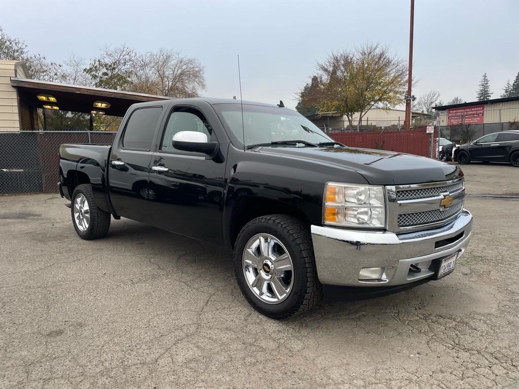 2013 Black Chevrolet Silverado 1500 LT (3GCPKSE78DG) with an 5.3L Vortec 5.3L Flex Fuel V8 315hp 335ft. lbs. Other engine, 6-Speed Shiftable Automatic transmission, located at 800 Riverside Ave, Roseville, CA, 95678, (916) 773-4549, 38.732265, -121.291039 - CREW CAB 4X4 LT LOW MILES SERVICE RECORDS ON CLEAN CARFAX - Photo#1