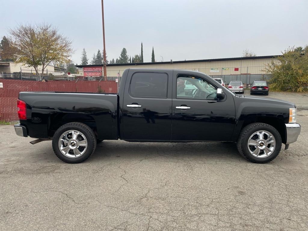 2013 Black Chevrolet Silverado 1500 LT (3GCPKSE78DG) with an 5.3L Vortec 5.3L Flex Fuel V8 315hp 335ft. lbs. Other engine, 6-Speed Shiftable Automatic transmission, located at 800 Riverside Ave, Roseville, CA, 95678, (916) 773-4549, 38.732265, -121.291039 - CREW CAB 4X4 LT LOW MILES SERVICE RECORDS ON CLEAN CARFAX - Photo#5