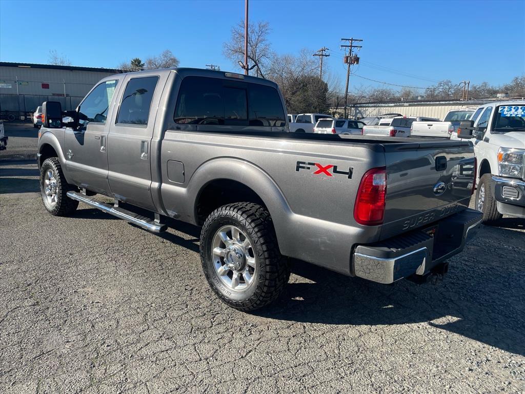 2011 Sterling Grey Metallic Ford F-250 Super Duty Lariat (1FT7W2BT3BE) with an 6.7L Power Stroke 6.7L Biodiesel Turbo V8 400hp 800ft. lbs. Common Rail Direct Injection engine, 6-Speed Shiftable Automatic transmission, located at 800 Riverside Ave, Roseville, CA, 95678, (916) 773-4549, 38.732265, -121.291039 - DIESEL CREW CAB 4X4 FX4 NEW TIRES SERVICE RECORDS - Photo#2