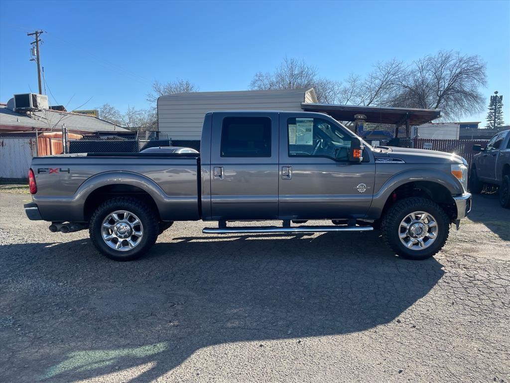 2011 Sterling Grey Metallic Ford F-250 Super Duty Lariat (1FT7W2BT3BE) with an 6.7L Power Stroke 6.7L Biodiesel Turbo V8 400hp 800ft. lbs. Common Rail Direct Injection engine, 6-Speed Shiftable Automatic transmission, located at 800 Riverside Ave, Roseville, CA, 95678, (916) 773-4549, 38.732265, -121.291039 - DIESEL CREW CAB 4X4 FX4 NEW TIRES SERVICE RECORDS - Photo#4