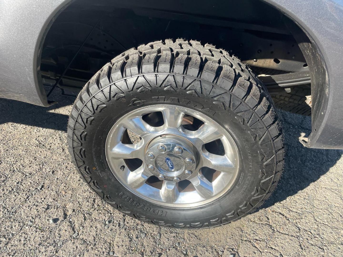 2011 Sterling Grey Metallic Ford F-250 Super Duty Lariat (1FT7W2BT3BE) with an 6.7L Power Stroke 6.7L Biodiesel Turbo V8 400hp 800ft. lbs. Common Rail Direct Injection engine, 6-Speed Shiftable Automatic transmission, located at 800 Riverside Ave, Roseville, CA, 95678, (916) 773-4549, 38.732265, -121.291039 - DIESEL CREW CAB 4X4 FX4 NEW TIRES SERVICE RECORDS - Photo#5