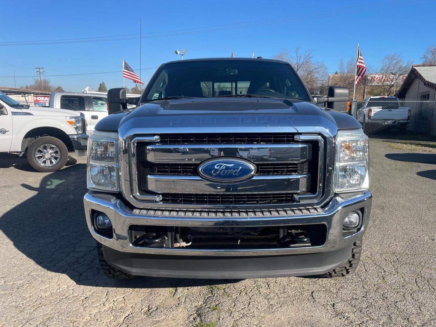 2011 Sterling Grey Metallic Ford F-250 Super Duty Lariat (1FT7W2BT3BE) with an 6.7L Power Stroke 6.7L Biodiesel Turbo V8 400hp 800ft. lbs. Common Rail Direct Injection engine, 6-Speed Shiftable Automatic transmission, located at 800 Riverside Ave, Roseville, CA, 95678, (916) 773-4549, 38.732265, -121.291039 - DIESEL CREW CAB 4X4 FX4 NEW TIRES SERVICE RECORDS - Photo#6