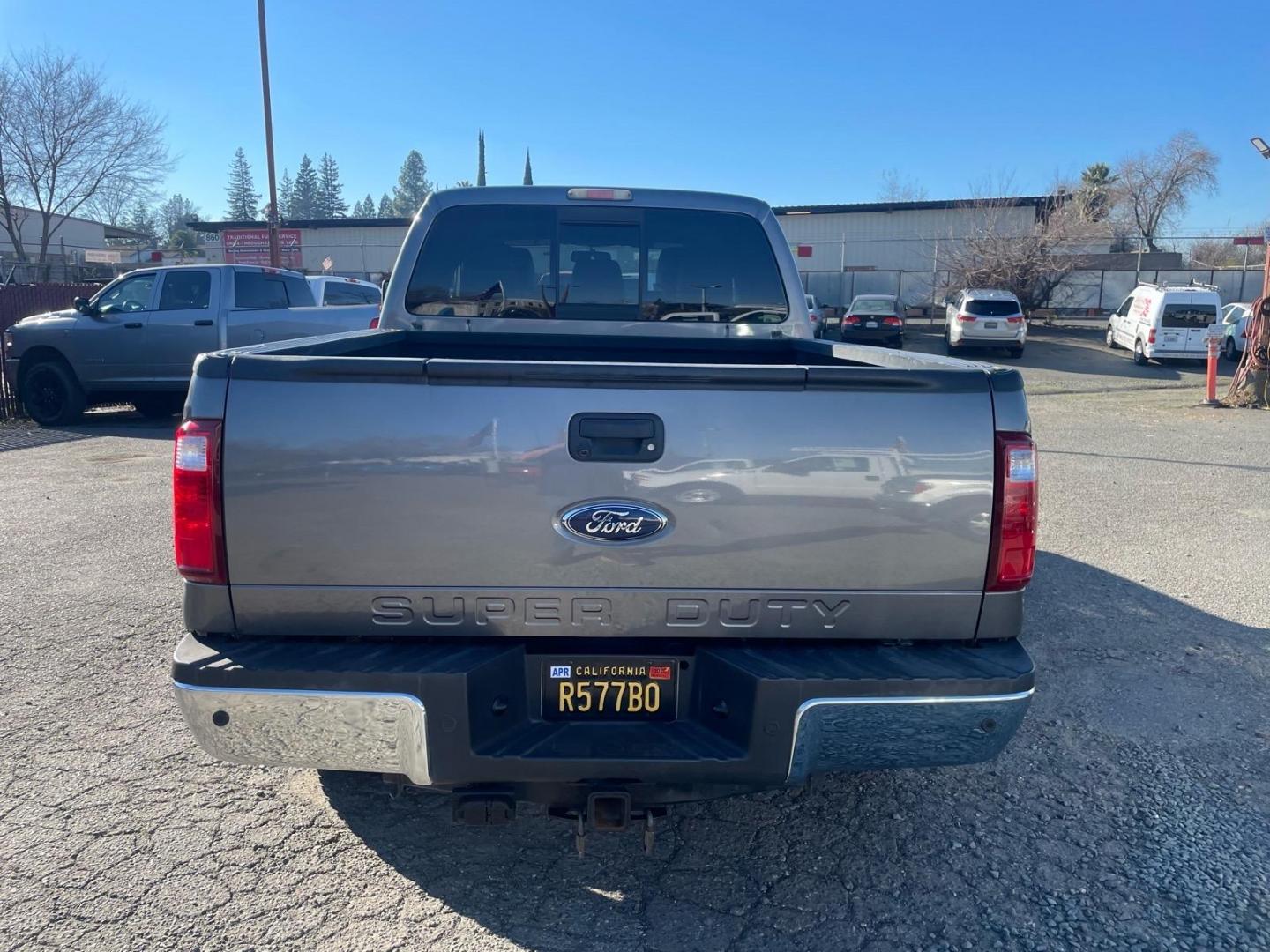 2011 Sterling Grey Metallic Ford F-250 Super Duty Lariat (1FT7W2BT3BE) with an 6.7L Power Stroke 6.7L Biodiesel Turbo V8 400hp 800ft. lbs. Common Rail Direct Injection engine, 6-Speed Shiftable Automatic transmission, located at 800 Riverside Ave, Roseville, CA, 95678, (916) 773-4549, 38.732265, -121.291039 - DIESEL CREW CAB 4X4 FX4 NEW TIRES SERVICE RECORDS - Photo#7
