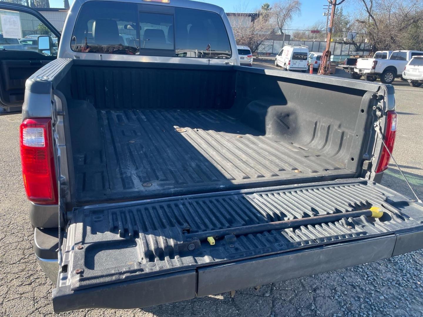 2011 Sterling Grey Metallic Ford F-250 Super Duty Lariat (1FT7W2BT3BE) with an 6.7L Power Stroke 6.7L Biodiesel Turbo V8 400hp 800ft. lbs. Common Rail Direct Injection engine, 6-Speed Shiftable Automatic transmission, located at 800 Riverside Ave, Roseville, CA, 95678, (916) 773-4549, 38.732265, -121.291039 - DIESEL CREW CAB 4X4 FX4 NEW TIRES SERVICE RECORDS - Photo#8