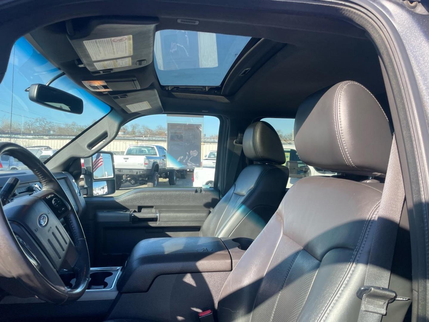 2011 Sterling Grey Metallic Ford F-250 Super Duty Lariat (1FT7W2BT3BE) with an 6.7L Power Stroke 6.7L Biodiesel Turbo V8 400hp 800ft. lbs. Common Rail Direct Injection engine, 6-Speed Shiftable Automatic transmission, located at 800 Riverside Ave, Roseville, CA, 95678, (916) 773-4549, 38.732265, -121.291039 - DIESEL CREW CAB 4X4 FX4 NEW TIRES SERVICE RECORDS - Photo#9