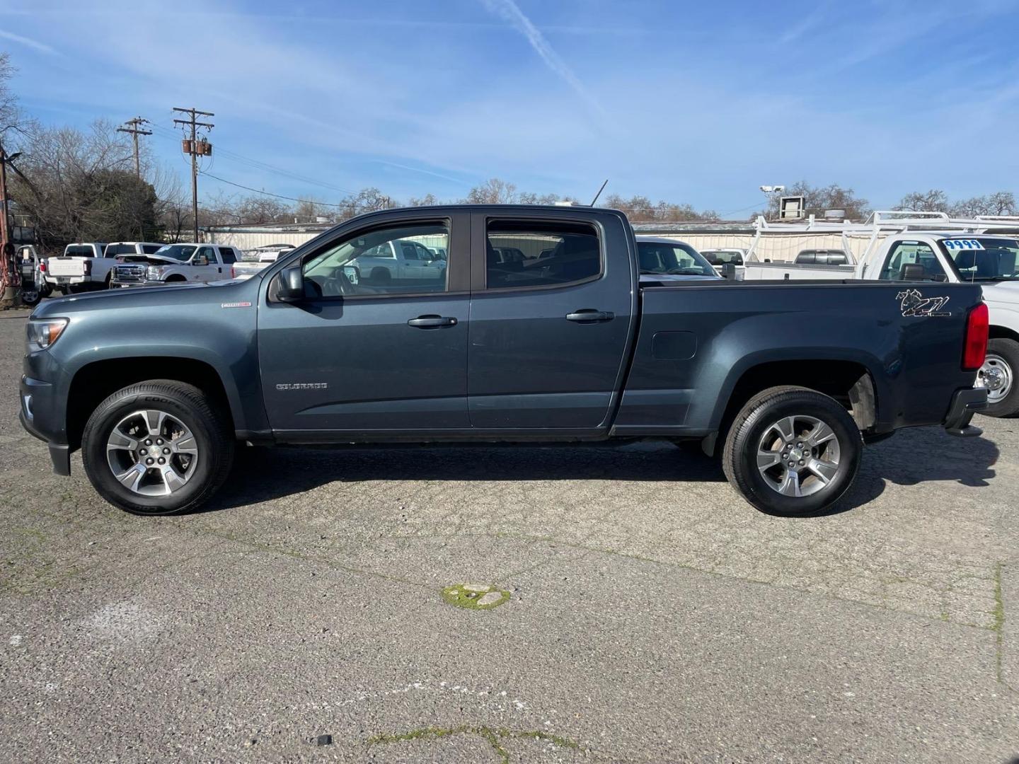 2019 Satin Steel Metallic Chevrolet Colorado Z71 (1GCPTDE18K1) with an 2.8L Duramax 2.8L Diesel Turbo I4 181hp 369ft. lbs. Common Rail Direct Injection engine, 6-Speed Shiftable Automatic transmission, located at 800 Riverside Ave, Roseville, CA, 95678, (916) 773-4549, 38.732265, -121.291039- Photo#5