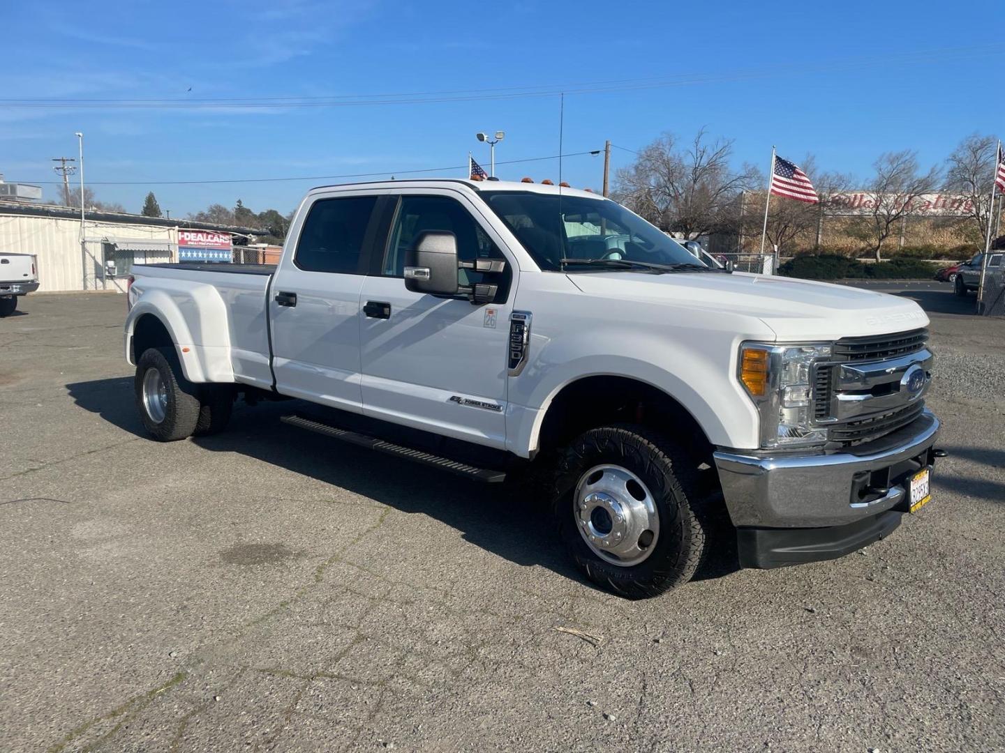 2017 Oxford White Ford F-350 Super Duty XL (1FT8W3DTXHE) with an 6.7L Power Stroke 6.7L Biodiesel Turbo V8 440hp 925ft. lbs. Common Rail Direct Injection engine, 6-Speed Shiftable Automatic transmission, located at 800 Riverside Ave, Roseville, CA, 95678, (916) 773-4549, 38.732265, -121.291039 - DIESEL CREW CAB DUALLY 4X4 FX4 CLEAN CARFAX - Photo#1