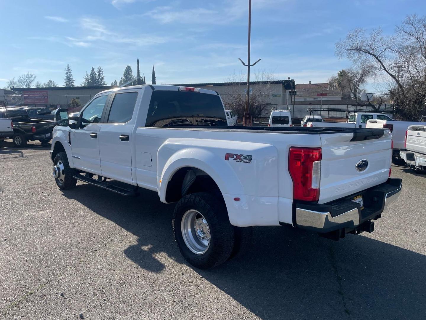2017 Oxford White Ford F-350 Super Duty XL (1FT8W3DTXHE) with an 6.7L Power Stroke 6.7L Biodiesel Turbo V8 440hp 925ft. lbs. Common Rail Direct Injection engine, 6-Speed Shiftable Automatic transmission, located at 800 Riverside Ave, Roseville, CA, 95678, (916) 773-4549, 38.732265, -121.291039 - DIESEL CREW CAB DUALLY 4X4 FX4 CLEAN CARFAX - Photo#2