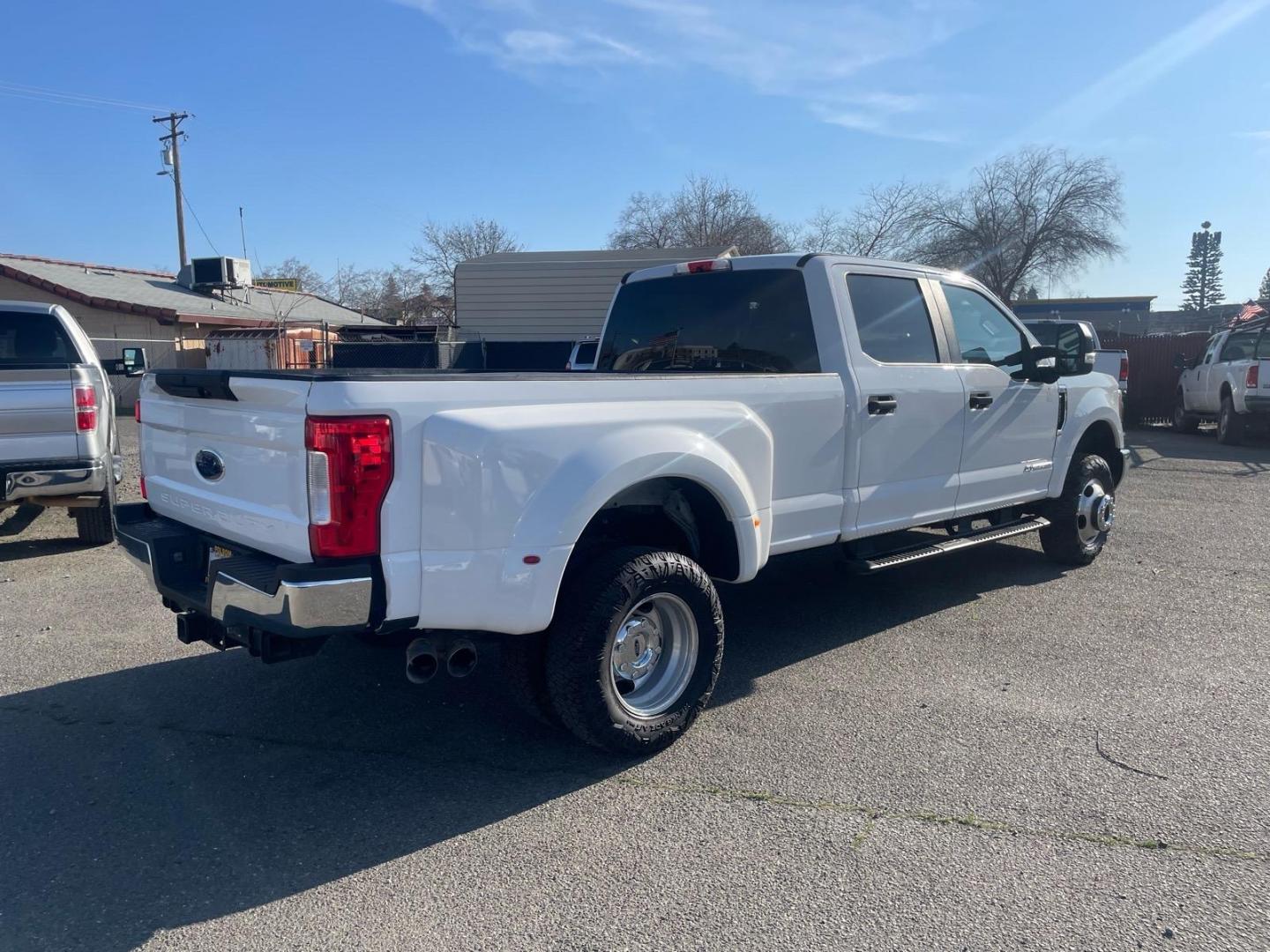 2017 Oxford White Ford F-350 Super Duty XL (1FT8W3DTXHE) with an 6.7L Power Stroke 6.7L Biodiesel Turbo V8 440hp 925ft. lbs. Common Rail Direct Injection engine, 6-Speed Shiftable Automatic transmission, located at 800 Riverside Ave, Roseville, CA, 95678, (916) 773-4549, 38.732265, -121.291039 - DIESEL CREW CAB DUALLY 4X4 FX4 CLEAN CARFAX - Photo#3