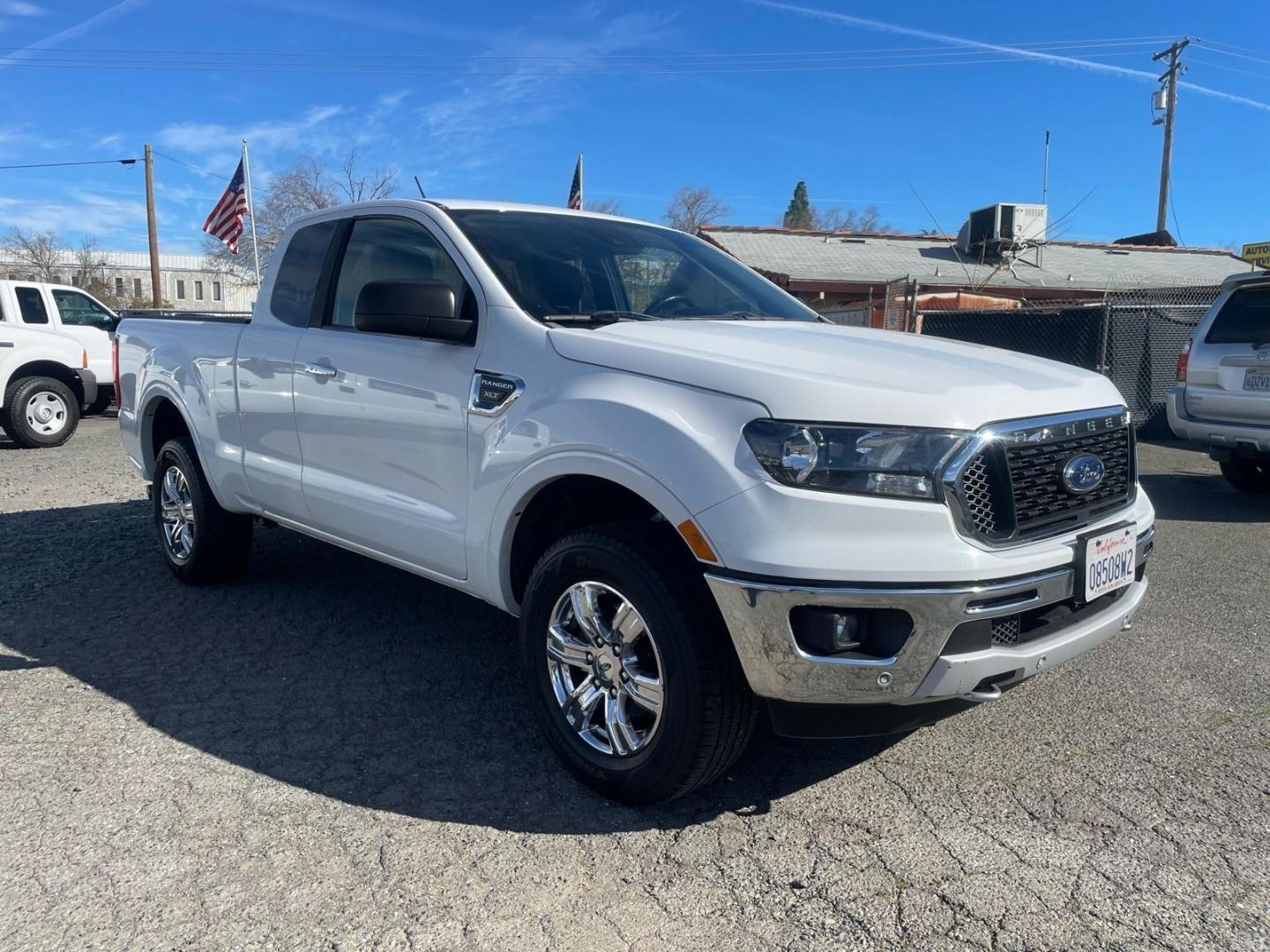 2019 Oxford White Ford Ranger XLT (1FTER1EH5KL) with an 2.3L EcoBoost 2.3L Turbo I4 270hp 310ft. lbs. Direct Injection engine, 10-Speed Shiftable Automatic transmission, located at 800 Riverside Ave, Roseville, CA, 95678, (916) 773-4549, 38.732265, -121.291039 - SUPER CAB ECOBOOST SERVICE RECORDS ON CLEAN CARFAX- Photo#1