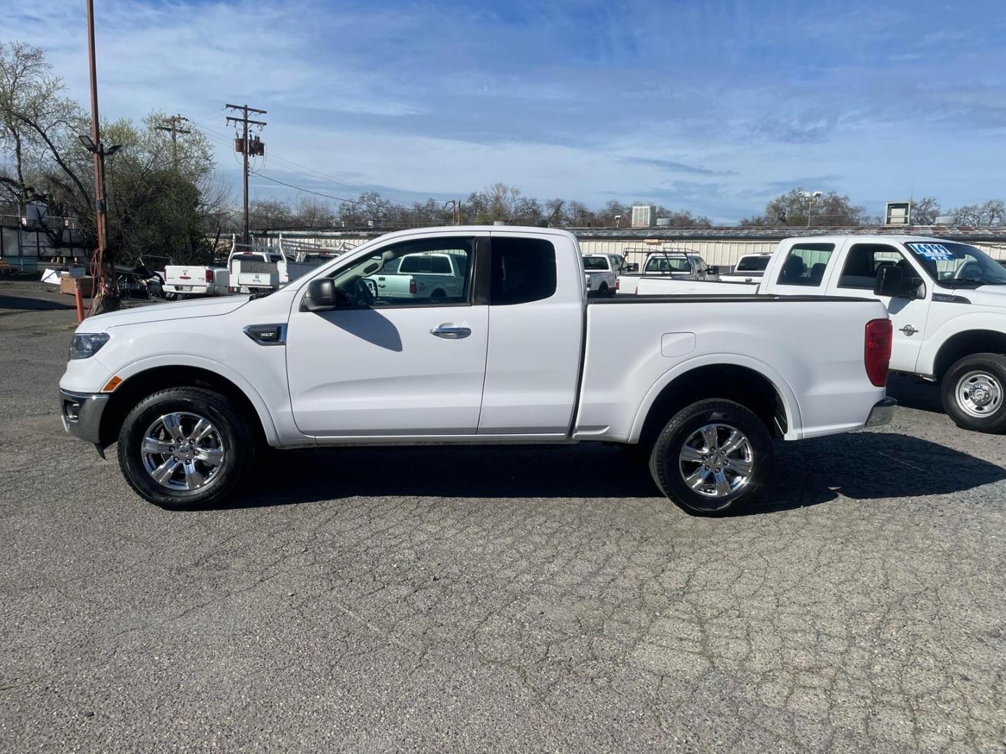 2019 Oxford White Ford Ranger XLT (1FTER1EH5KL) with an 2.3L EcoBoost 2.3L Turbo I4 270hp 310ft. lbs. Direct Injection engine, 10-Speed Shiftable Automatic transmission, located at 800 Riverside Ave, Roseville, CA, 95678, (916) 773-4549, 38.732265, -121.291039 - SUPER CAB ECOBOOST SERVICE RECORDS ON CLEAN CARFAX- Photo#4