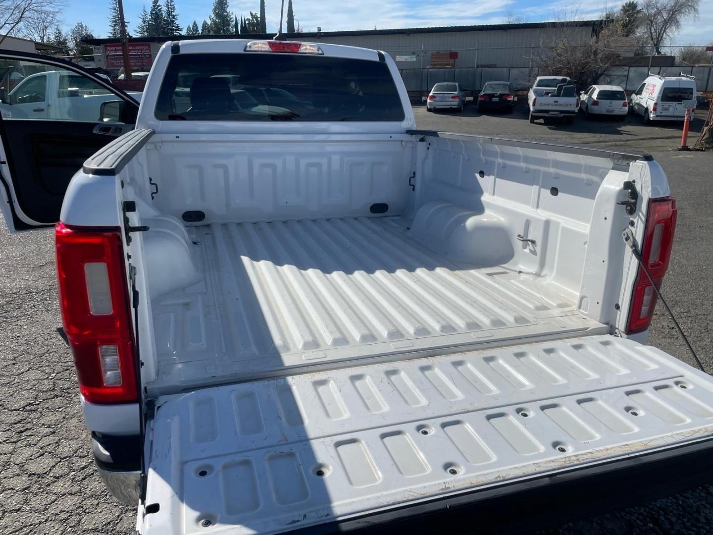 2019 Oxford White Ford Ranger XLT (1FTER1EH5KL) with an 2.3L EcoBoost 2.3L Turbo I4 270hp 310ft. lbs. Direct Injection engine, 10-Speed Shiftable Automatic transmission, located at 800 Riverside Ave, Roseville, CA, 95678, (916) 773-4549, 38.732265, -121.291039 - SUPER CAB ECOBOOST SERVICE RECORDS ON CLEAN CARFAX- Photo#9