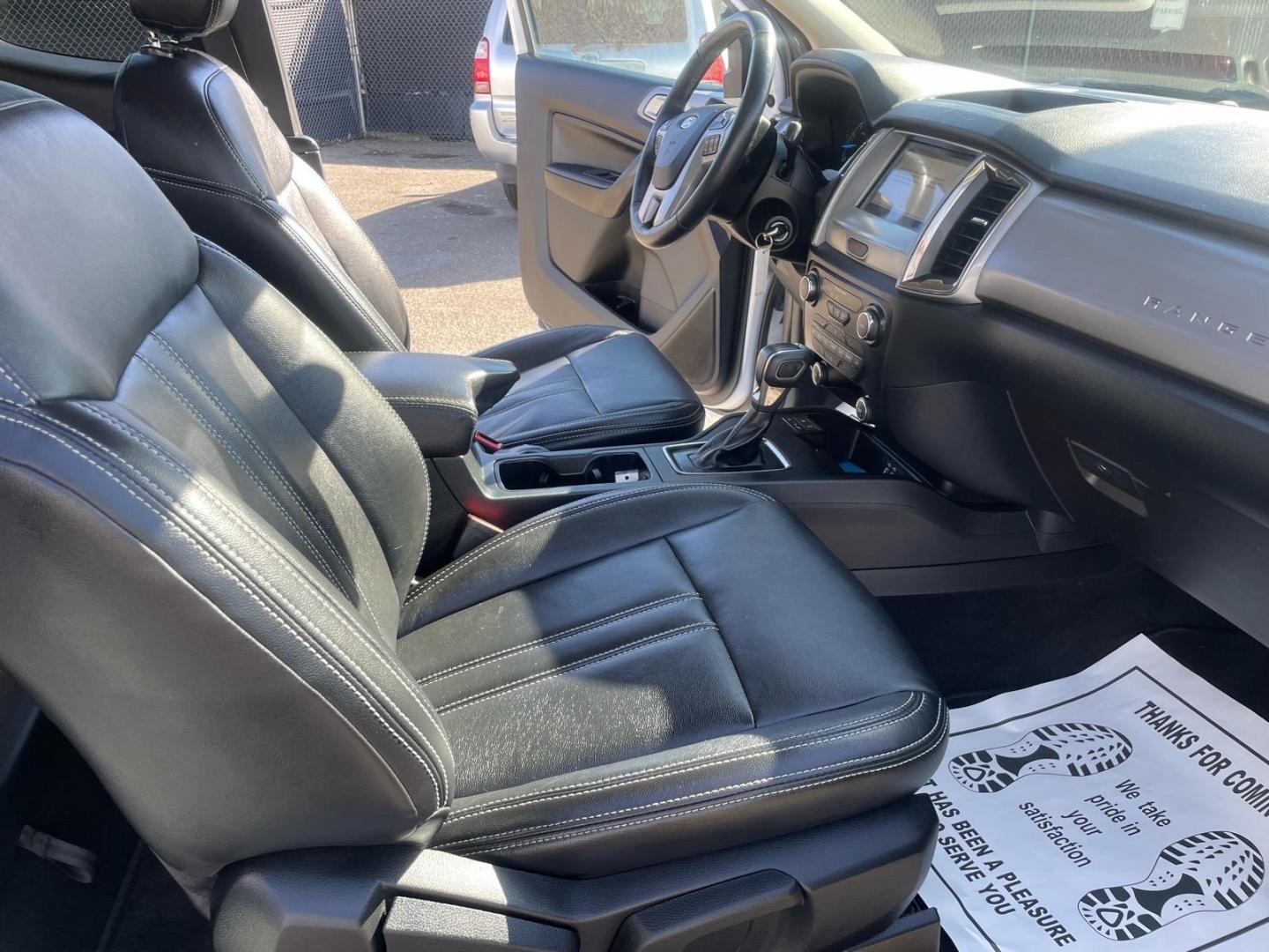 2019 Oxford White Ford Ranger XLT (1FTER1EH5KL) with an 2.3L EcoBoost 2.3L Turbo I4 270hp 310ft. lbs. Direct Injection engine, 10-Speed Shiftable Automatic transmission, located at 800 Riverside Ave, Roseville, CA, 95678, (916) 773-4549, 38.732265, -121.291039 - SUPER CAB ECOBOOST SERVICE RECORDS ON CLEAN CARFAX- Photo#12