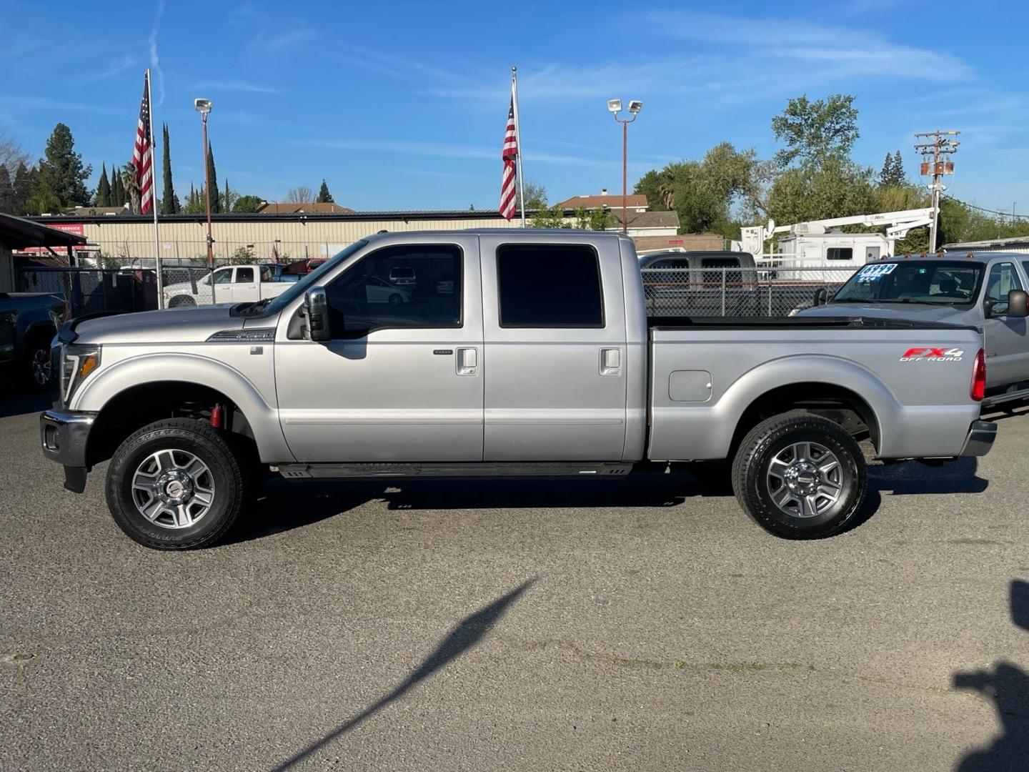2016 Ingot Silver Ford F-250 Super Duty Lariat (1FT7W2BT1GE) with an 6.7L Power Stroke 6.7L Biodiesel Turbo V8 440hp 860ft. lbs. Common Rail Direct Injection engine, 6-Speed Shiftable Automatic transmission, located at 800 Riverside Ave, Roseville, CA, 95678, (916) 773-4549, 38.732265, -121.291039 - DIESEL CREW CAB 4X4 FX4 LARIAT FULLY LOADED MOON ROOF - Photo#4