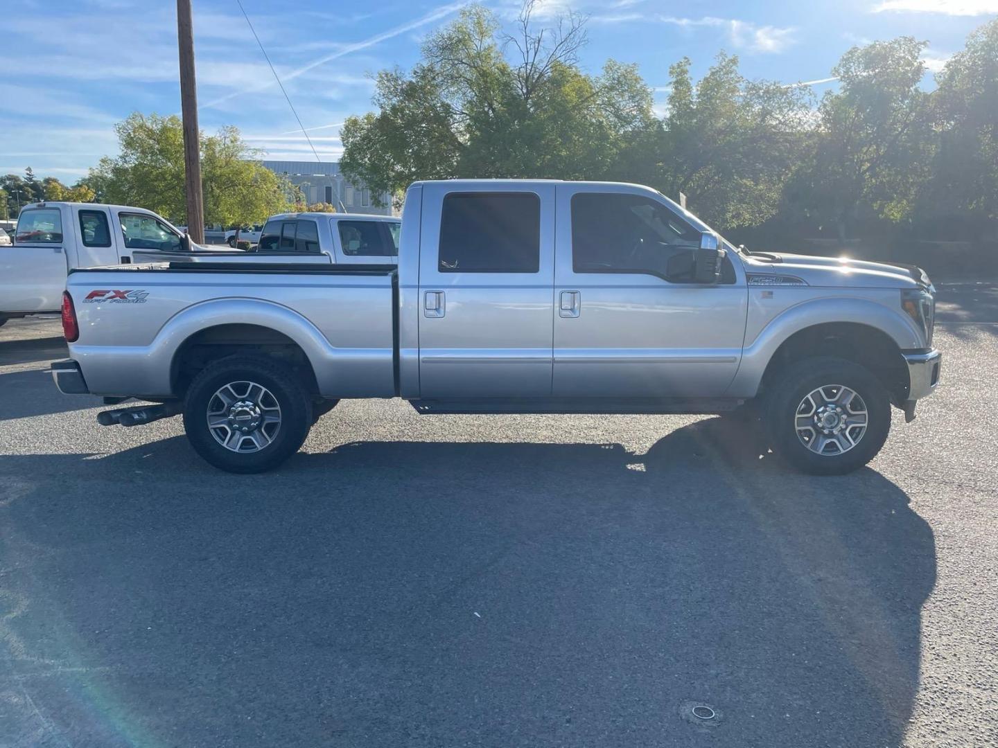 2016 Ingot Silver Ford F-250 Super Duty Lariat (1FT7W2BT1GE) with an 6.7L Power Stroke 6.7L Biodiesel Turbo V8 440hp 860ft. lbs. Common Rail Direct Injection engine, 6-Speed Shiftable Automatic transmission, located at 800 Riverside Ave, Roseville, CA, 95678, (916) 773-4549, 38.732265, -121.291039 - DIESEL CREW CAB 4X4 FX4 LARIAT FULLY LOADED MOON ROOF - Photo#5