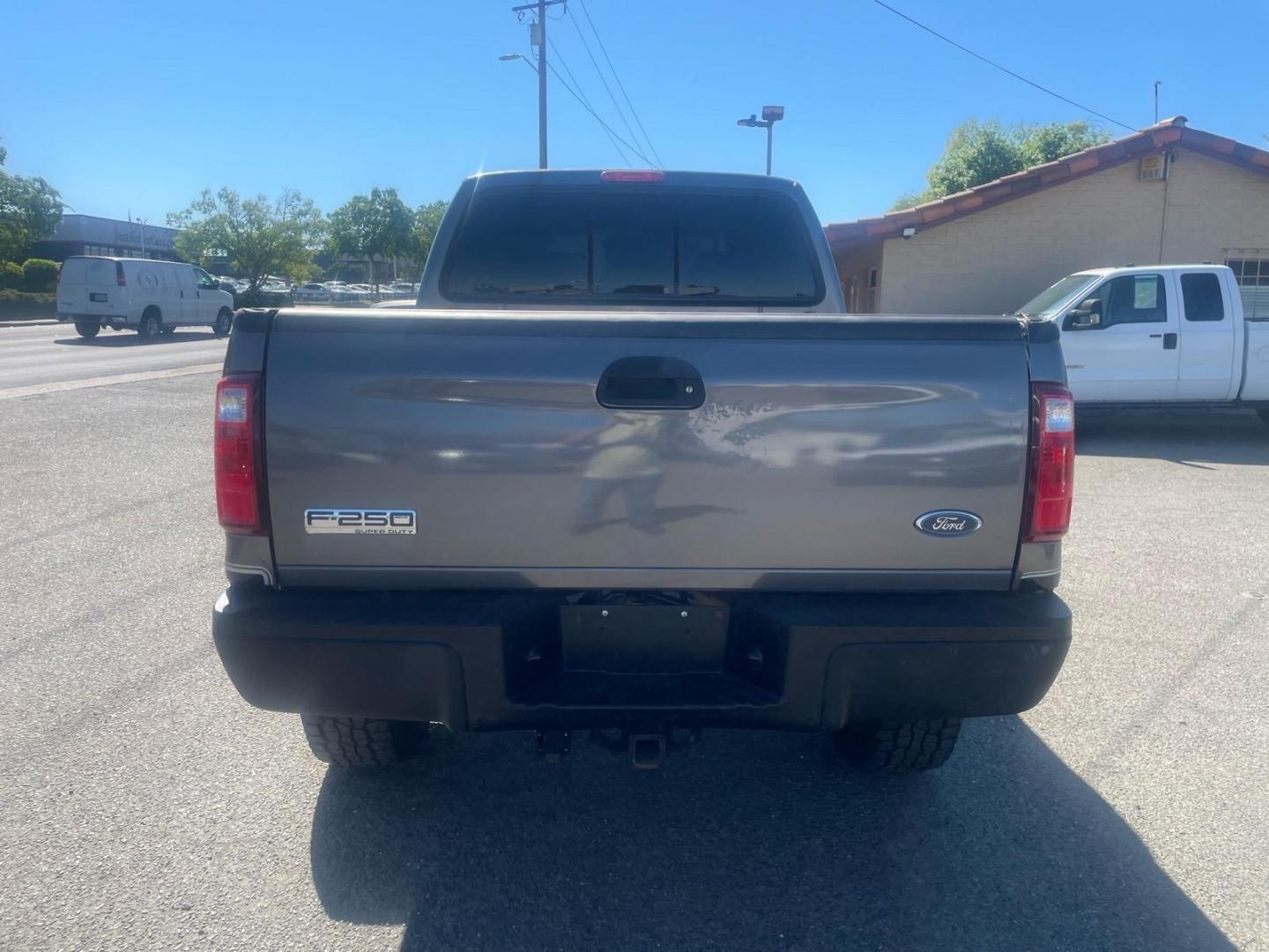 2003 Dark Shadow Grey Metallic/Black Ford F-250 Super Duty Lariat (1FTNW21P03E) with an Power Stroke 6.0L Diesel Turbo V8 325hp 560ft. lbs. Other engine, 5-Speed Automatic transmission, located at 800 Riverside Ave, Roseville, CA, 95678, (916) 773-4549, 38.732265, -121.291039 - Photo#3