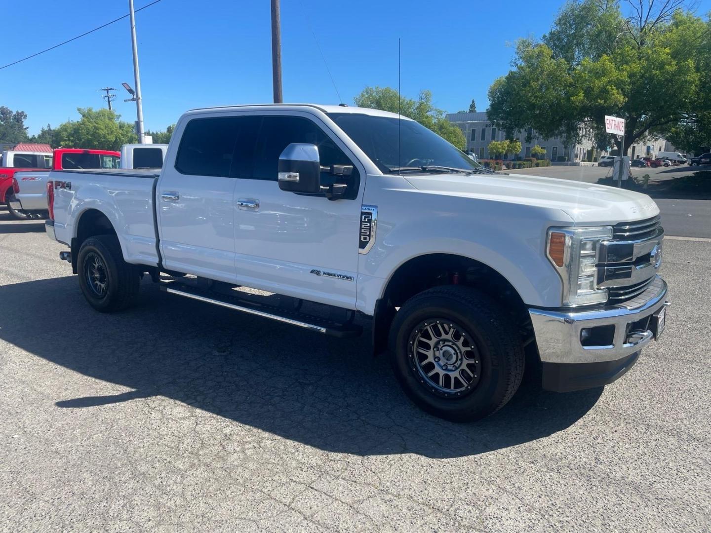 2017 Oxford White Ford F-250 Super Duty Lariat (1FT7W2BT0HE) with an 6.7L Power Stroke 6.7L Biodiesel Turbo V8 440hp 925ft. lbs. Common Rail Direct Injection engine, 6-Speed Shiftable Automatic transmission, located at 800 Riverside Ave, Roseville, CA, 95678, (916) 773-4549, 38.732265, -121.291039 - DIESEL CREW CAB 4X4 FX4 LARIAT TWIN PANEL MOON ROOF SERVICE RECORDS - Photo#1
