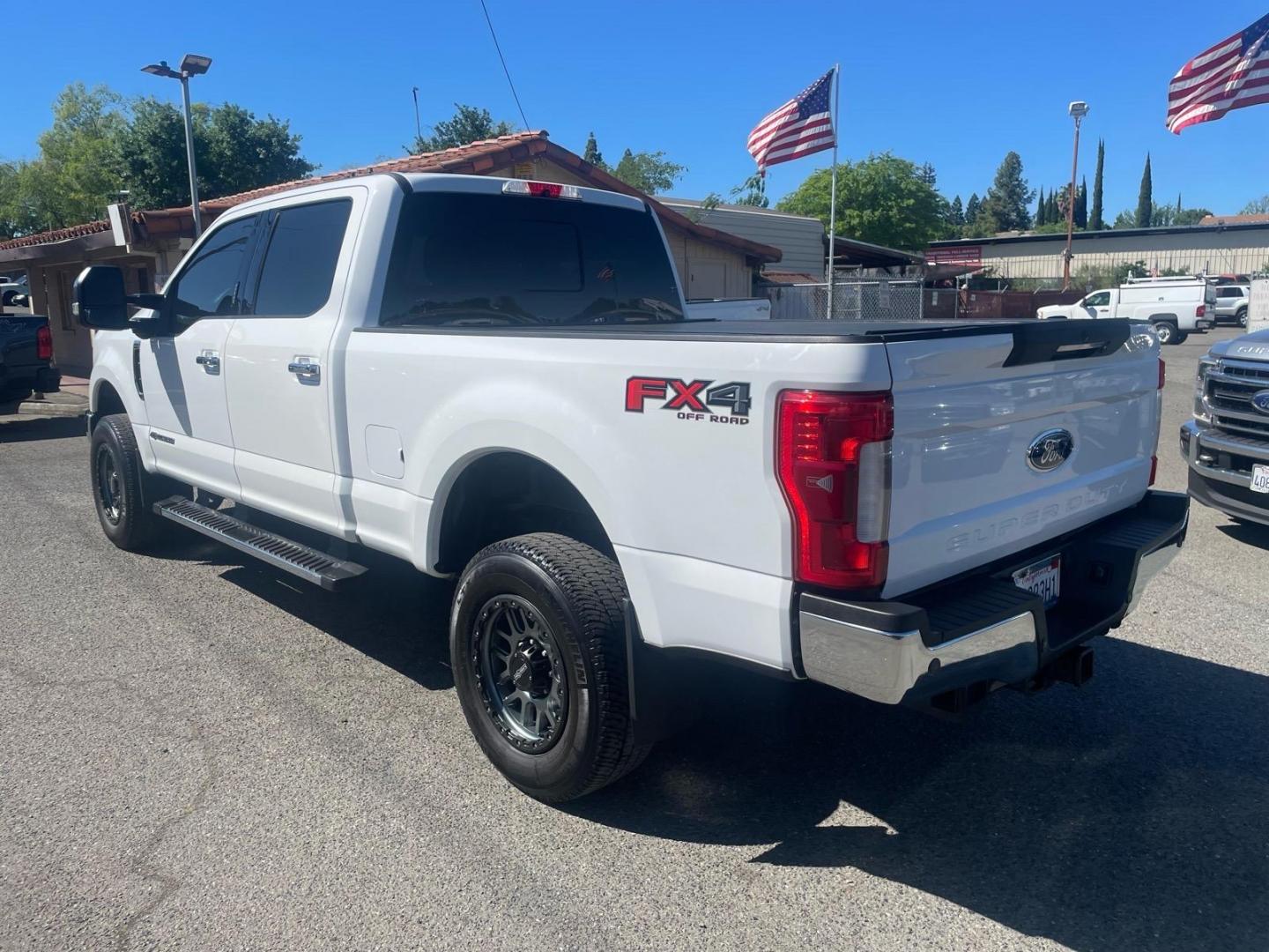 2017 Oxford White Ford F-250 Super Duty Lariat (1FT7W2BT0HE) with an 6.7L Power Stroke 6.7L Biodiesel Turbo V8 440hp 925ft. lbs. Common Rail Direct Injection engine, 6-Speed Shiftable Automatic transmission, located at 800 Riverside Ave, Roseville, CA, 95678, (916) 773-4549, 38.732265, -121.291039 - DIESEL CREW CAB 4X4 FX4 LARIAT TWIN PANEL MOON ROOF SERVICE RECORDS - Photo#2