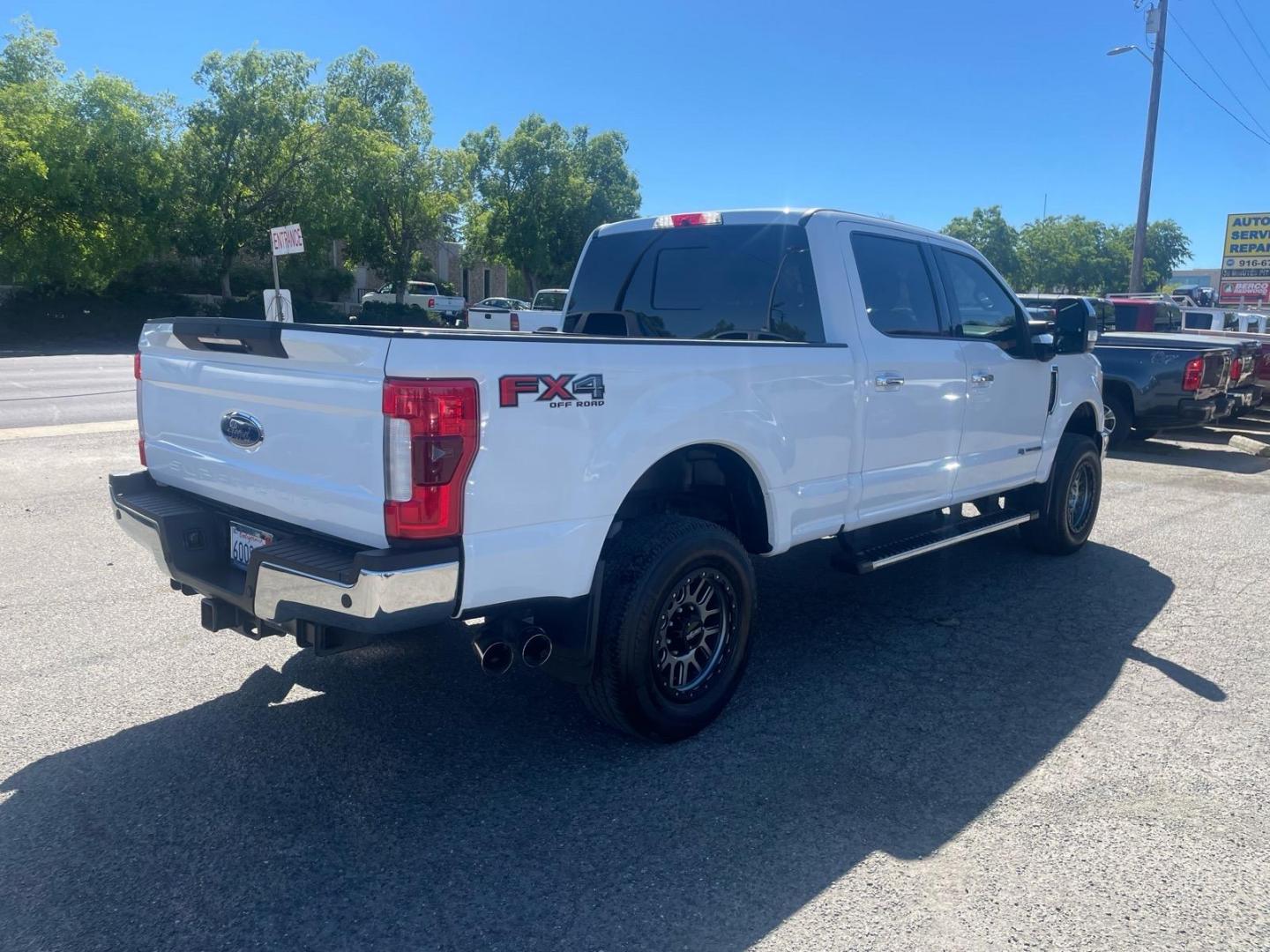 2017 Oxford White Ford F-250 Super Duty Lariat (1FT7W2BT0HE) with an 6.7L Power Stroke 6.7L Biodiesel Turbo V8 440hp 925ft. lbs. Common Rail Direct Injection engine, 6-Speed Shiftable Automatic transmission, located at 800 Riverside Ave, Roseville, CA, 95678, (916) 773-4549, 38.732265, -121.291039 - DIESEL CREW CAB 4X4 FX4 LARIAT TWIN PANEL MOON ROOF SERVICE RECORDS - Photo#3