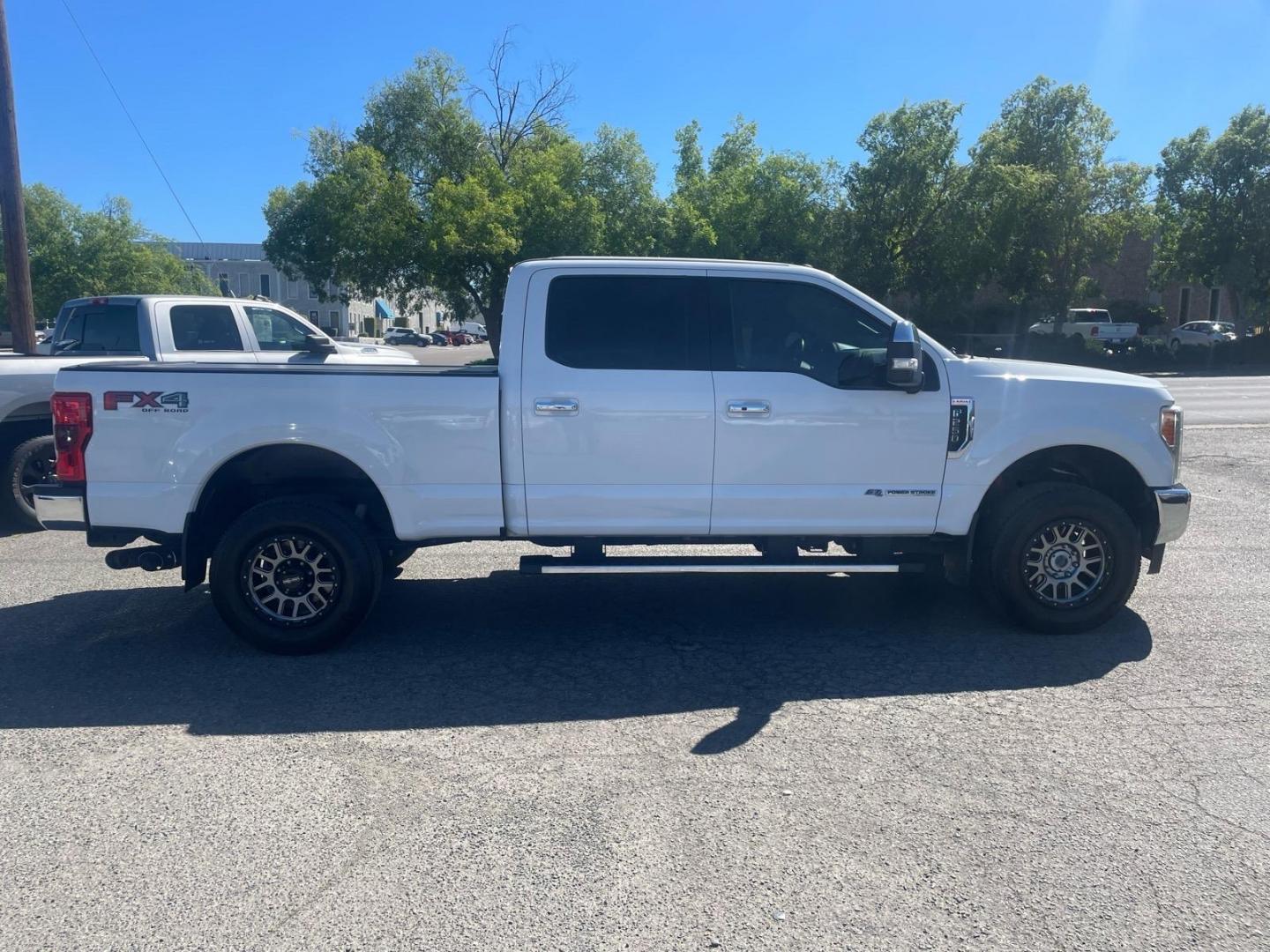 2017 Oxford White Ford F-250 Super Duty Lariat (1FT7W2BT0HE) with an 6.7L Power Stroke 6.7L Biodiesel Turbo V8 440hp 925ft. lbs. Common Rail Direct Injection engine, 6-Speed Shiftable Automatic transmission, located at 800 Riverside Ave, Roseville, CA, 95678, (916) 773-4549, 38.732265, -121.291039 - DIESEL CREW CAB 4X4 FX4 LARIAT TWIN PANEL MOON ROOF SERVICE RECORDS - Photo#5